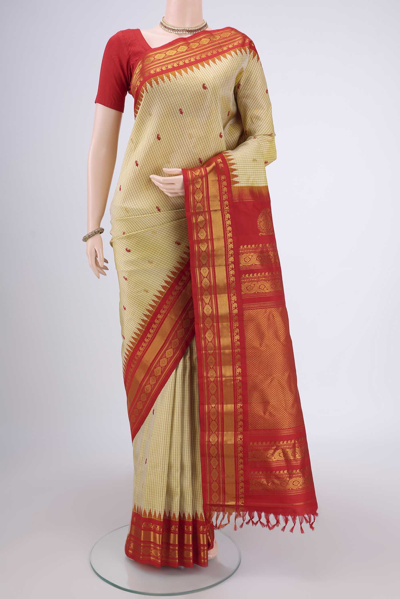 Acid Green Dual Tone Gadwal Silk Saree with Checked design on the body and Temple Border.  displayed on a mannequin