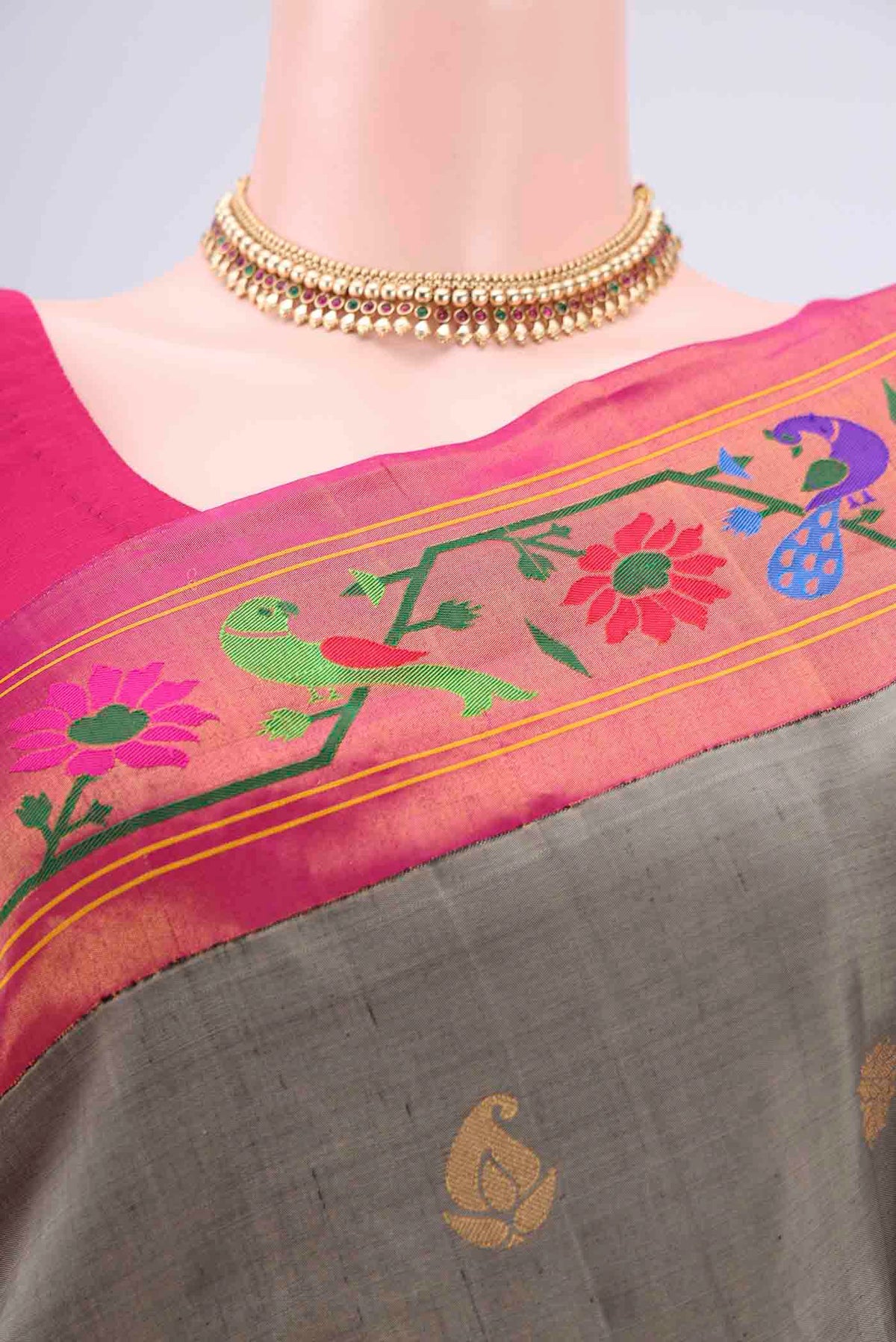 Border image of Davys Grey Gadwal Silk Saree with Zari Butta on the body and Paithani Border. 