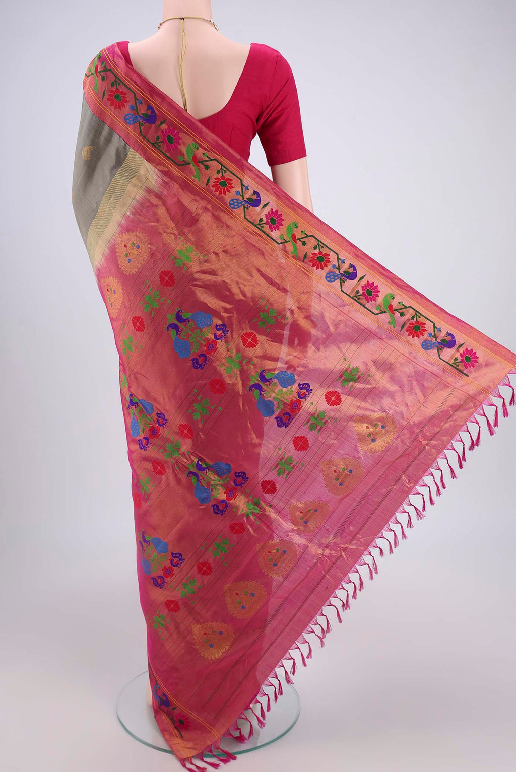 Flat view of Davys Grey Gadwal Silk Saree with Zari Butta on the body and Paithani Border. 