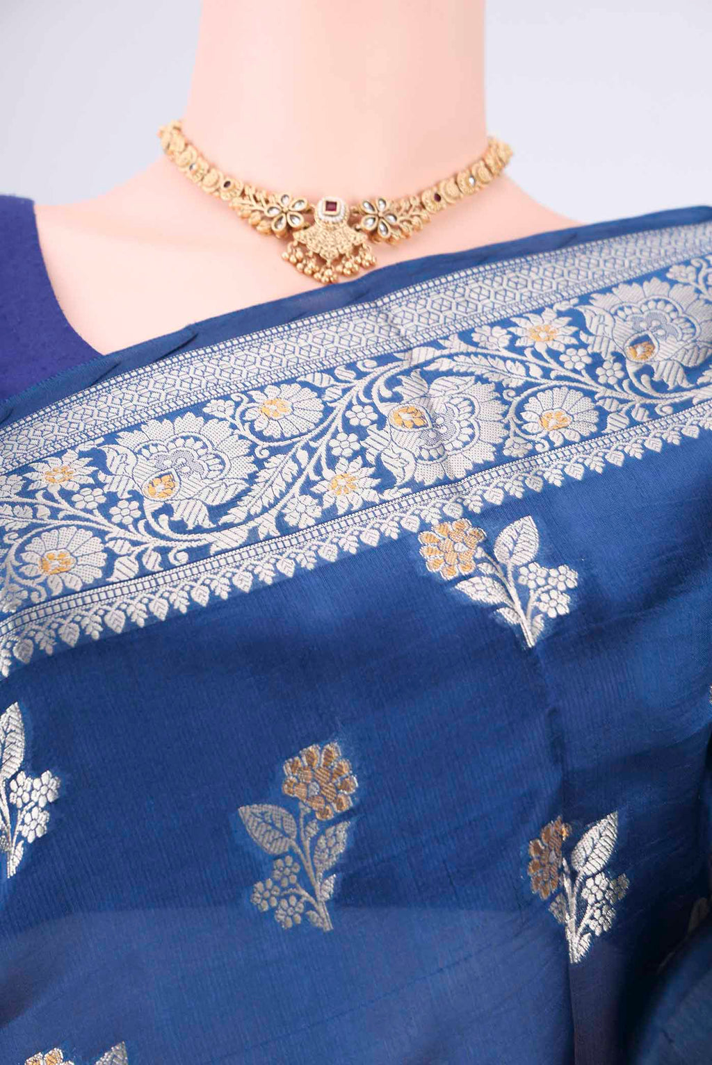 Border image of Blue Banarasi Raw Silk Saree with Zari Butta on the body and Zari Border. 