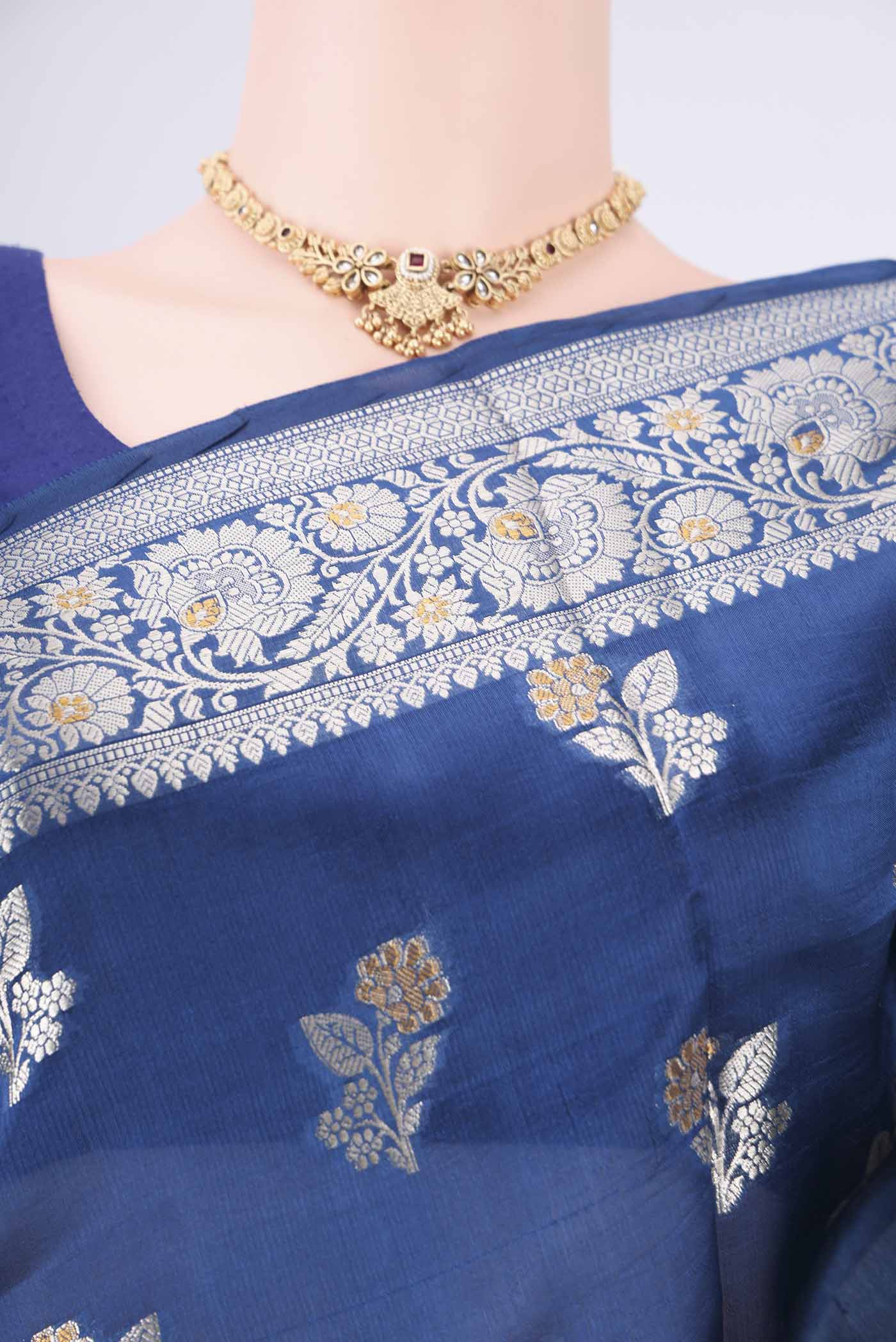 Border image of Blue Banarasi Raw Silk Saree with Zari Butta on the body and Zari Border. 