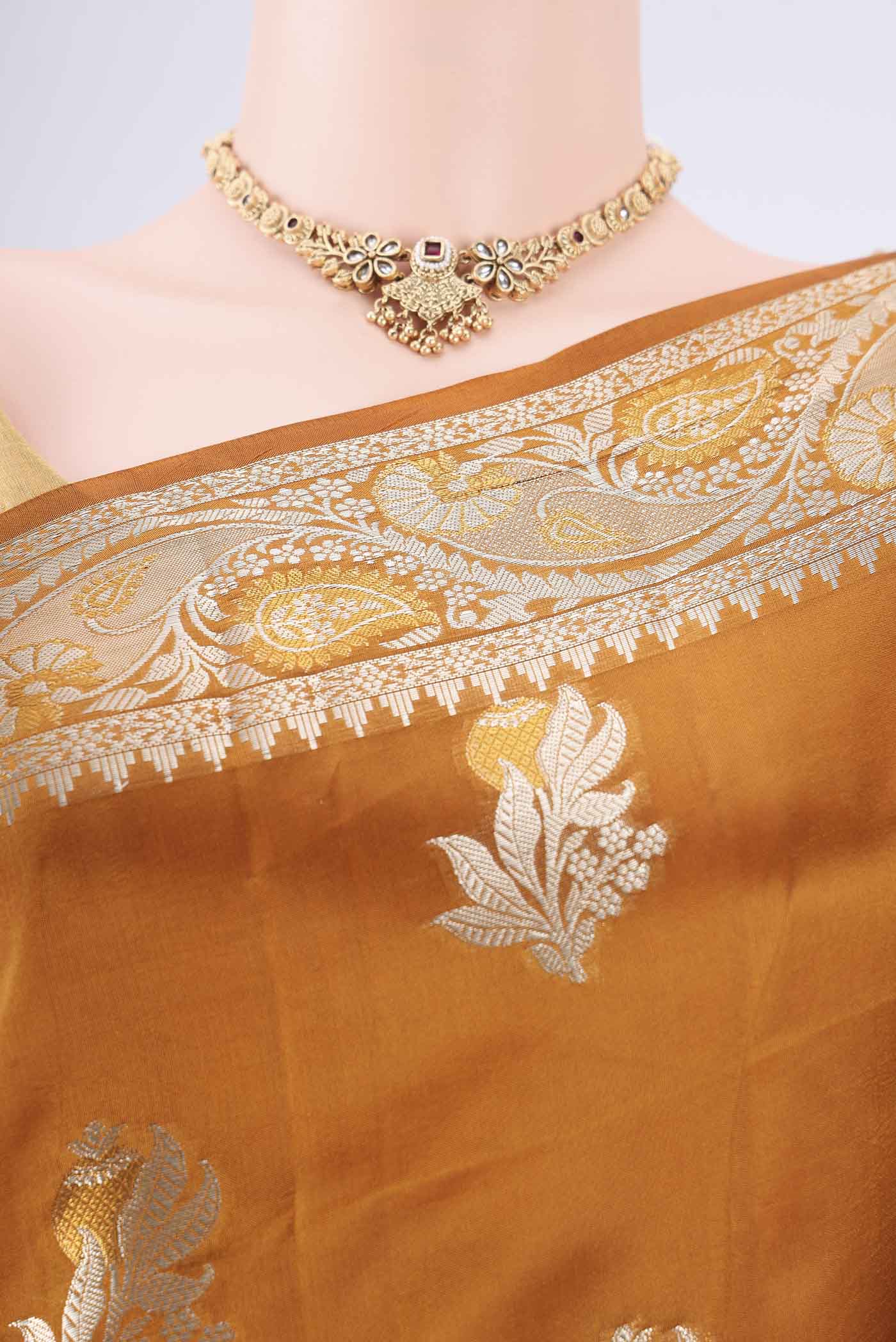 Border image of Caramel Banarasi Raw Silk Saree with Zari Butta on the body and Zari Border. 