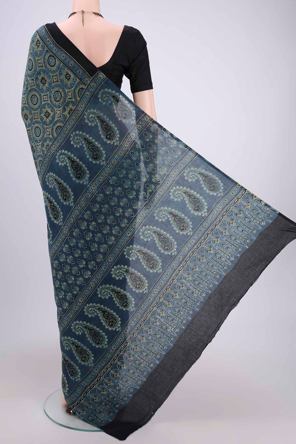 Flat view of Dark Blue Maheshwari Silk Cotton Saree with Ajrakh Print on the body and Plain Border. 