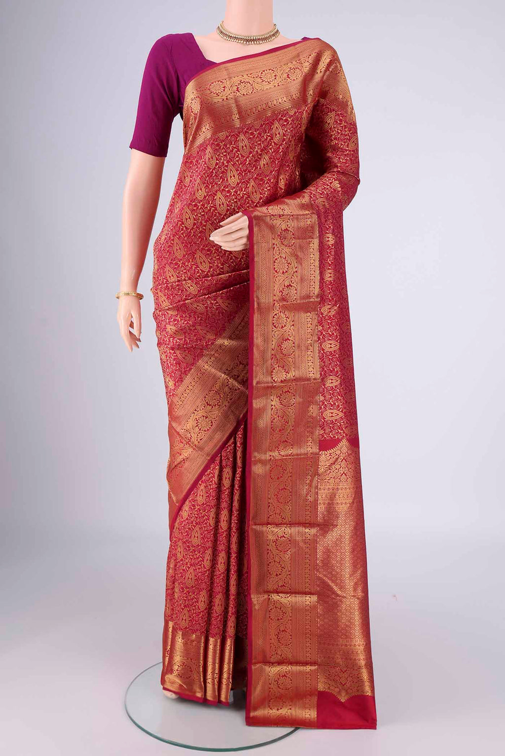 Maroon Bangalore Silk Saree with Zari Brocade on the body and Zari Border.  displayed on a mannequin