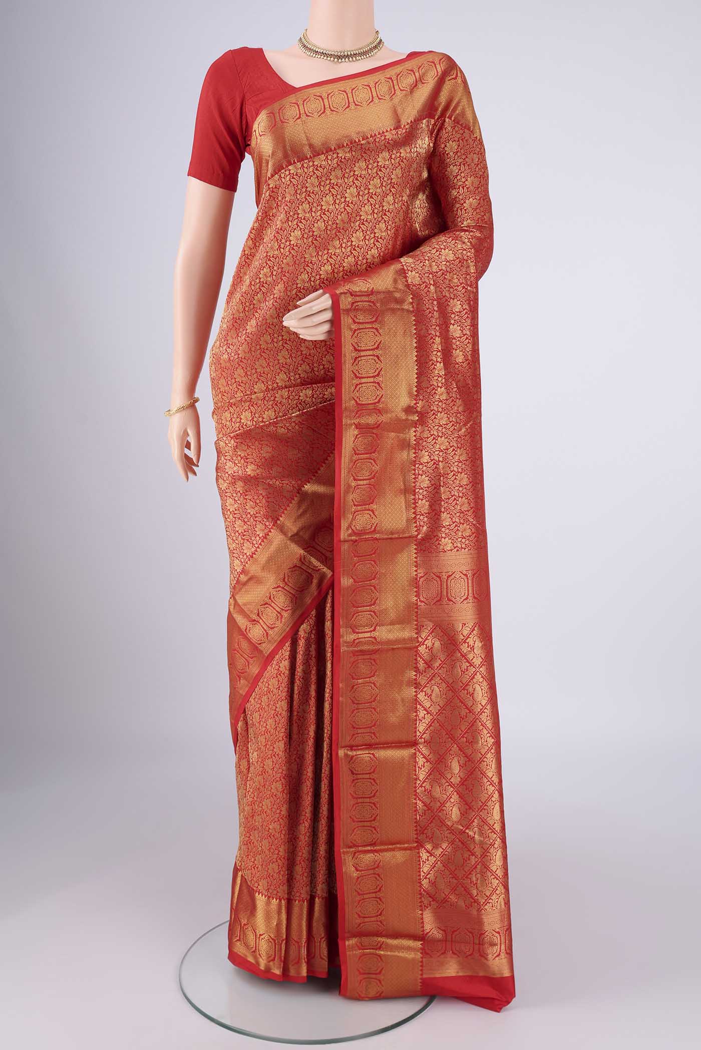 Red Bangalore Silk Saree with Zari Brocade on the body and Zari Border.  displayed on a mannequin