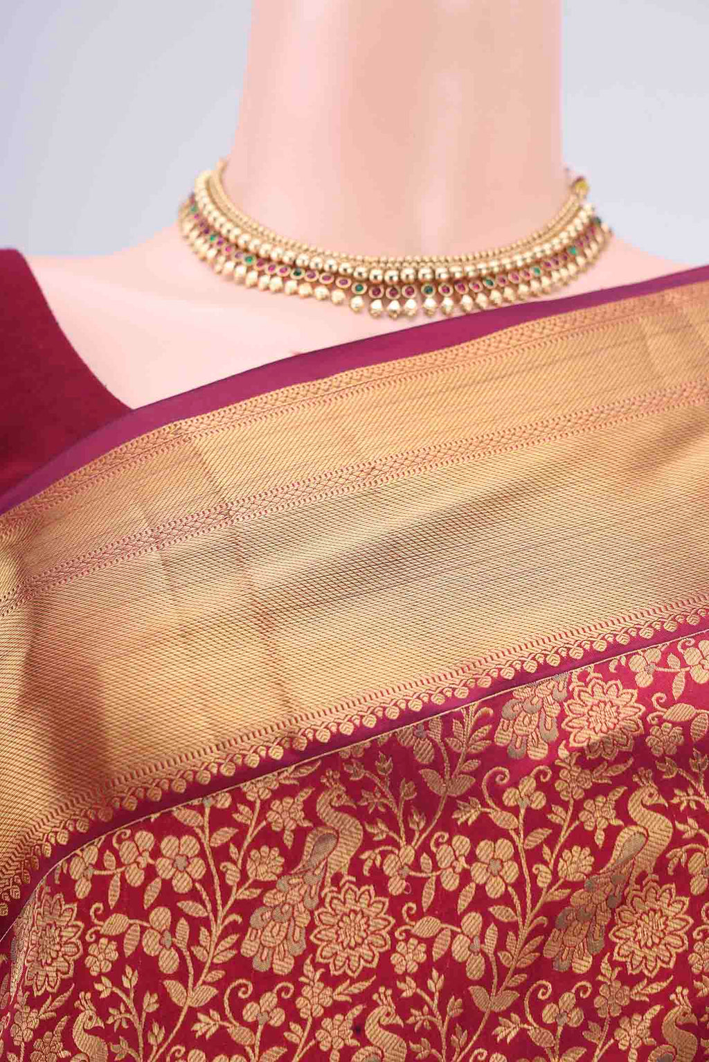 Border image of Maroon Bangalore Silk Saree with Zari Brocade on the body and Zari Border. 
