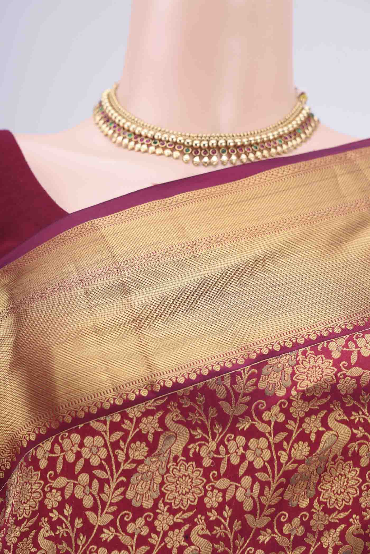 Border image of Maroon Bangalore Silk Saree with Zari Brocade on the body and Zari Border. 