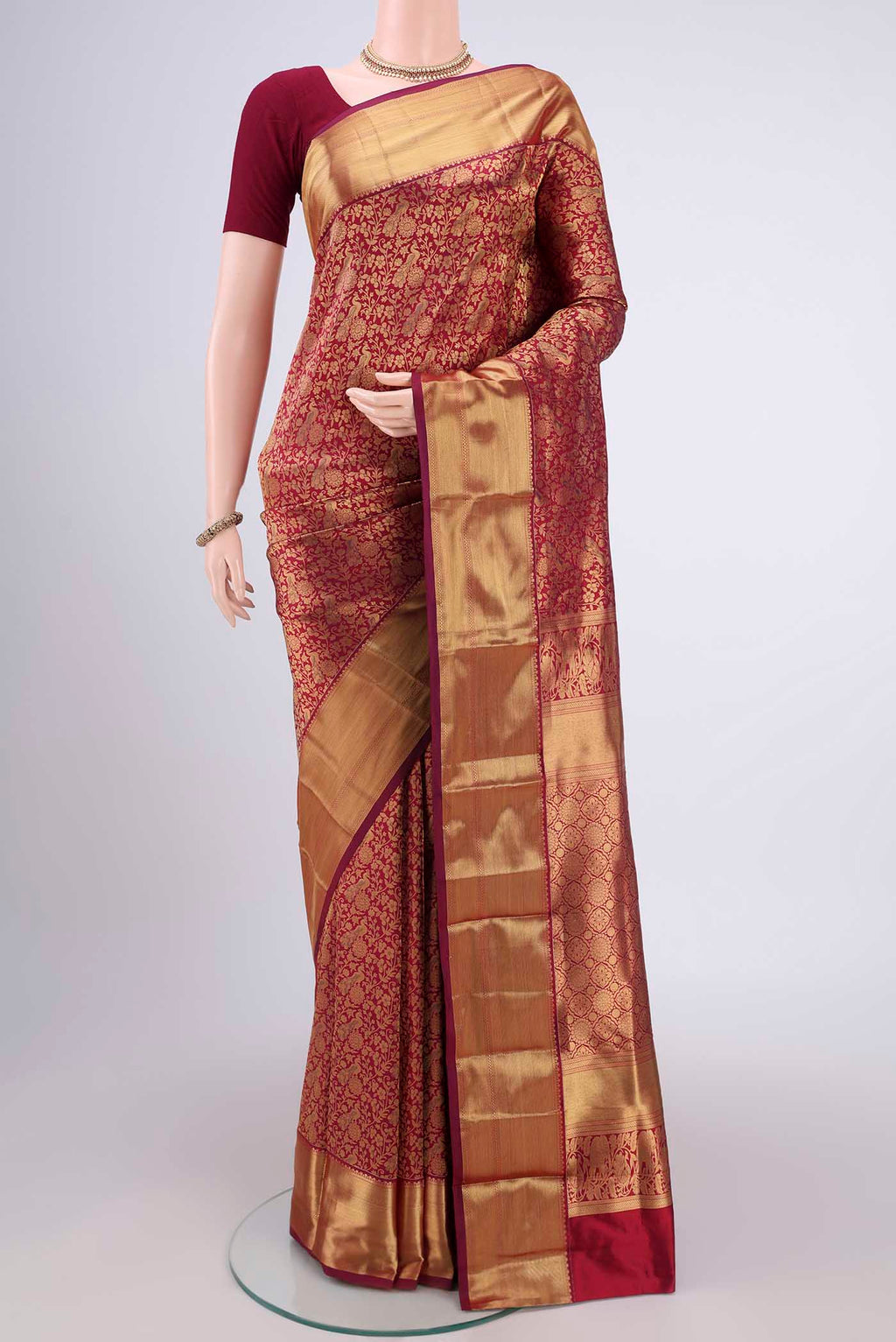 Maroon Bangalore Silk Saree with Zari Brocade on the body and Zari Border.  displayed on a mannequin