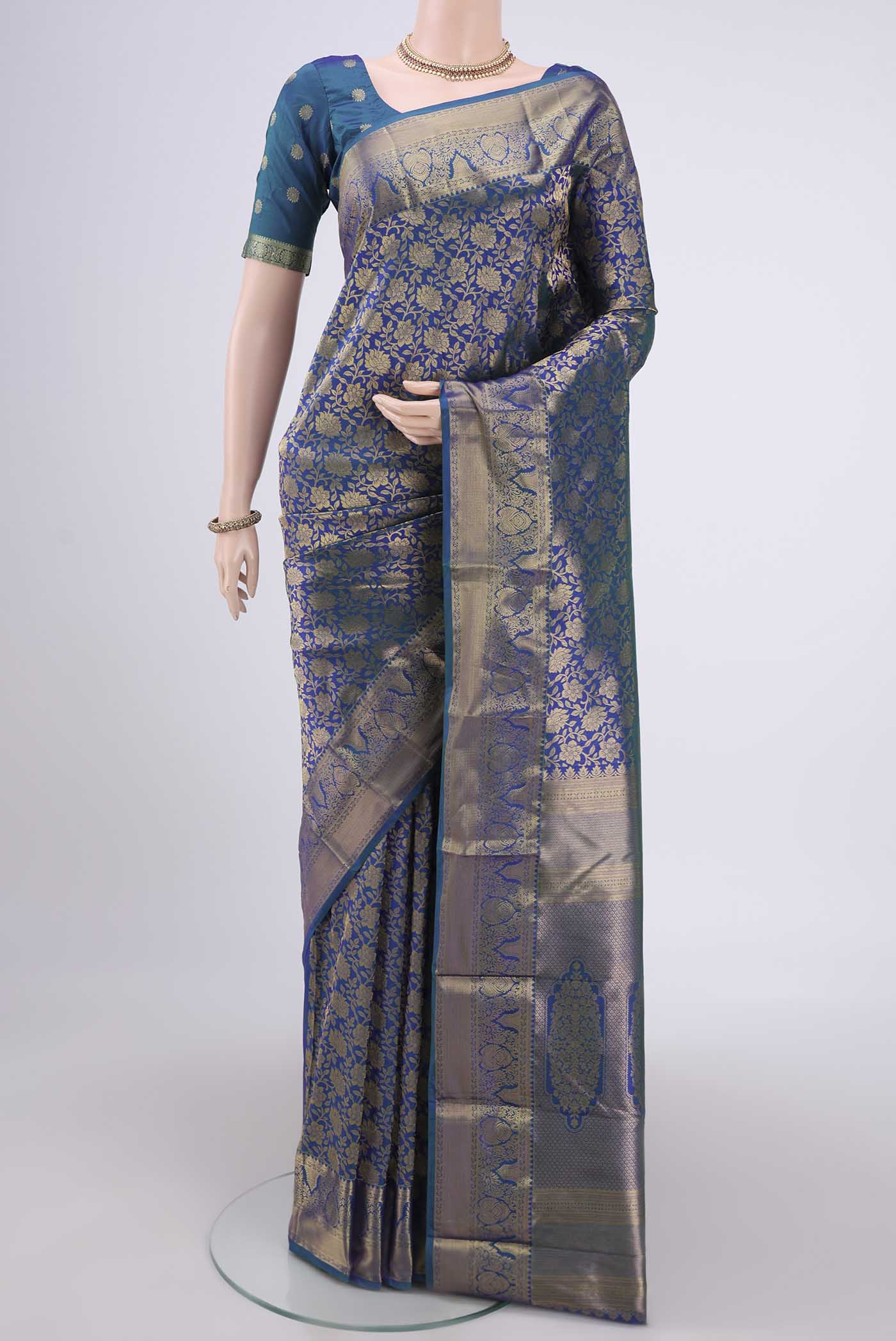 Blue Dual Tone Bangalore Silk Saree with Zari Brocade on the body and Zari Border.  displayed on a mannequin