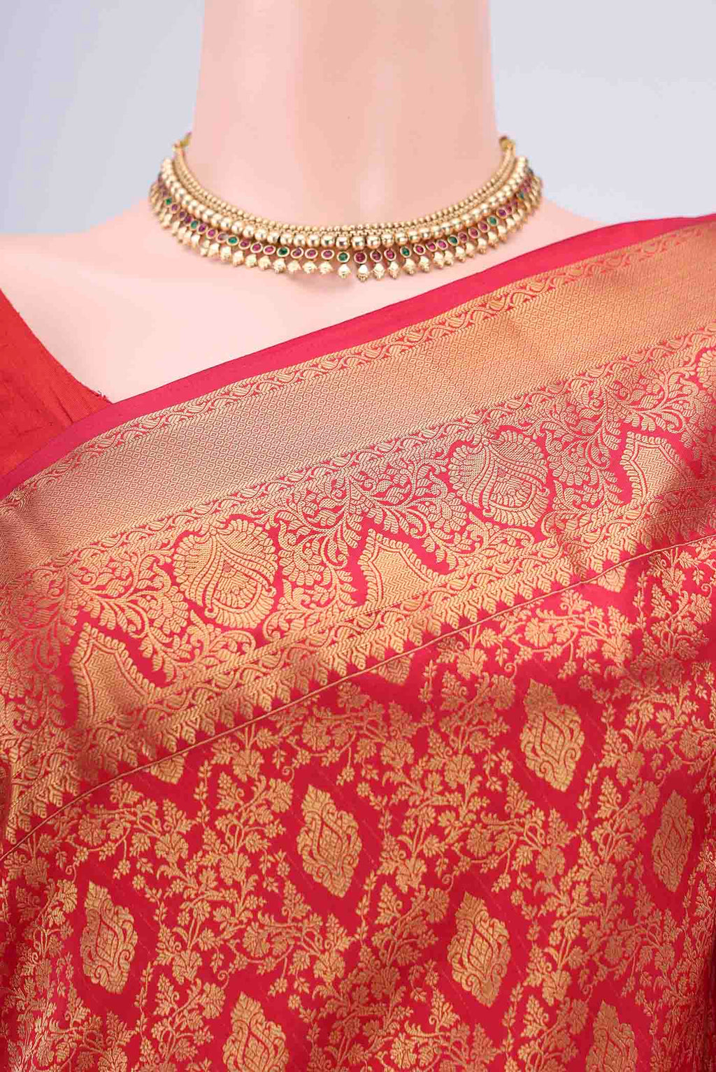 Border image of Red Bangalore Silk Saree with Zari Brocade on the body and Zari Border. 