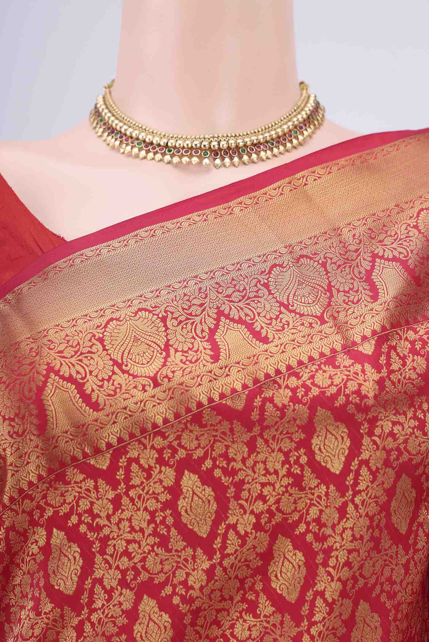 Border image of Red Bangalore Silk Saree with Zari Brocade on the body and Zari Border. 