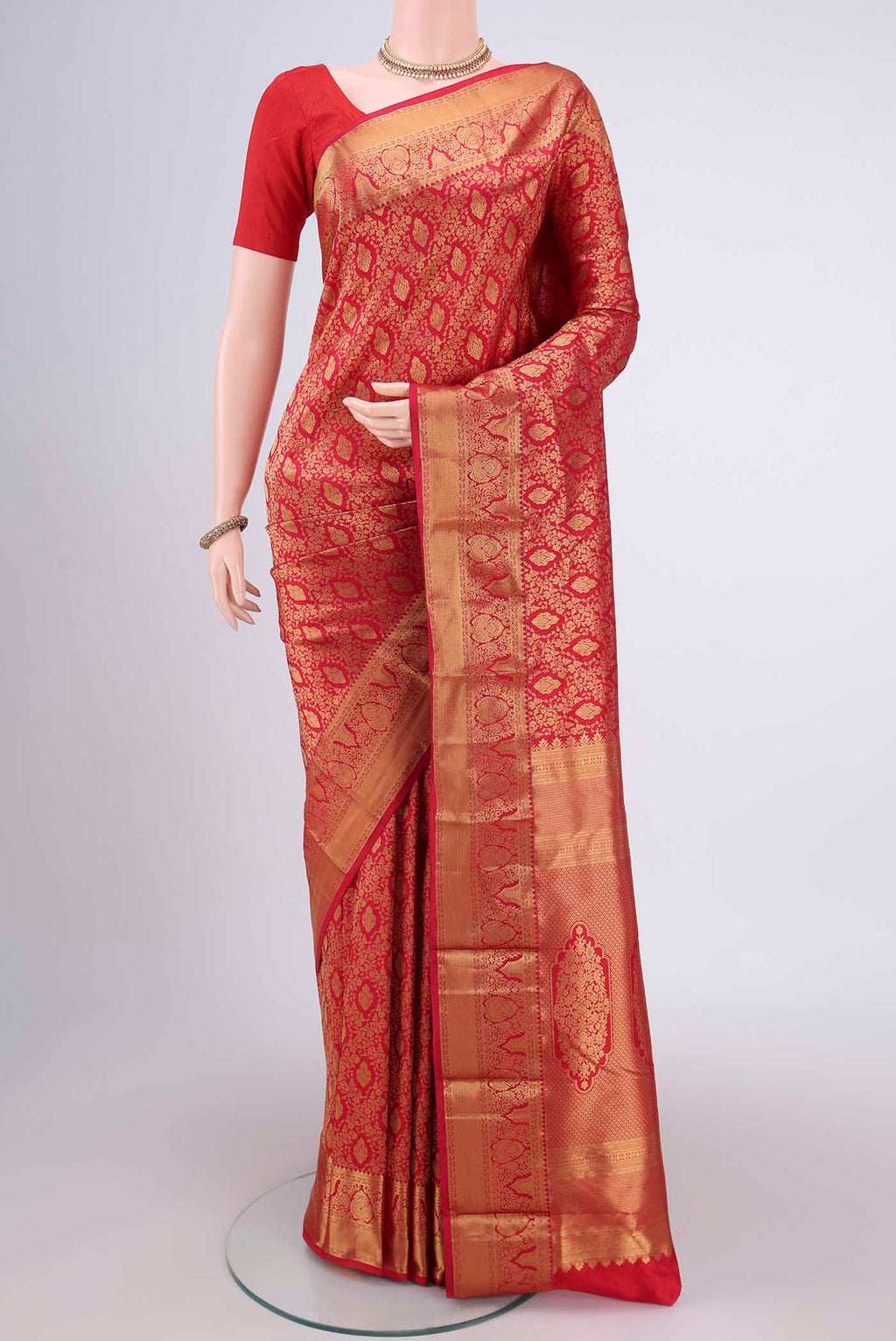 Red Bangalore Silk Saree with Zari Brocade on the body and Zari Border.  displayed on a mannequin
