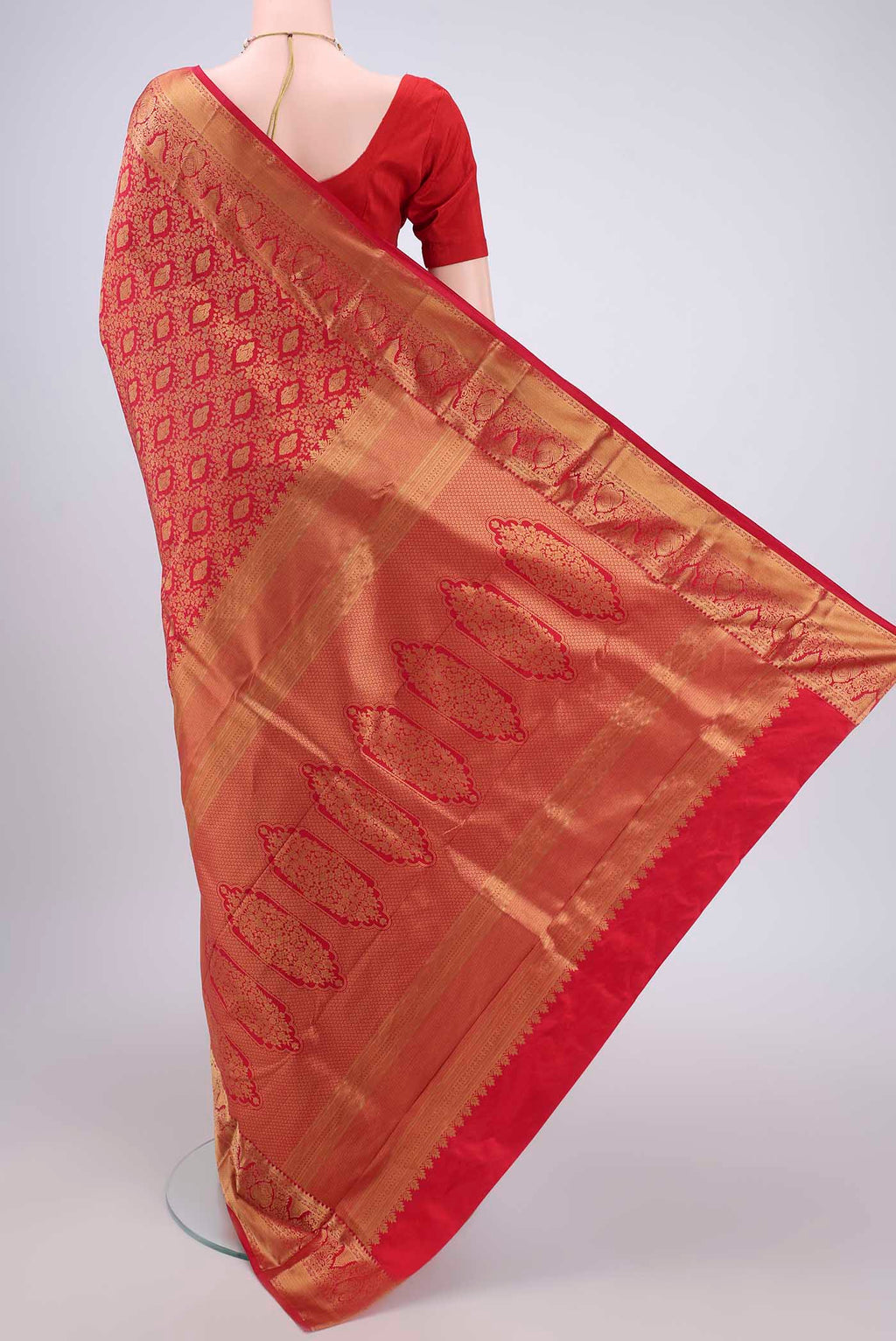 Flat view of Red Bangalore Silk Saree with Zari Brocade on the body and Zari Border. 