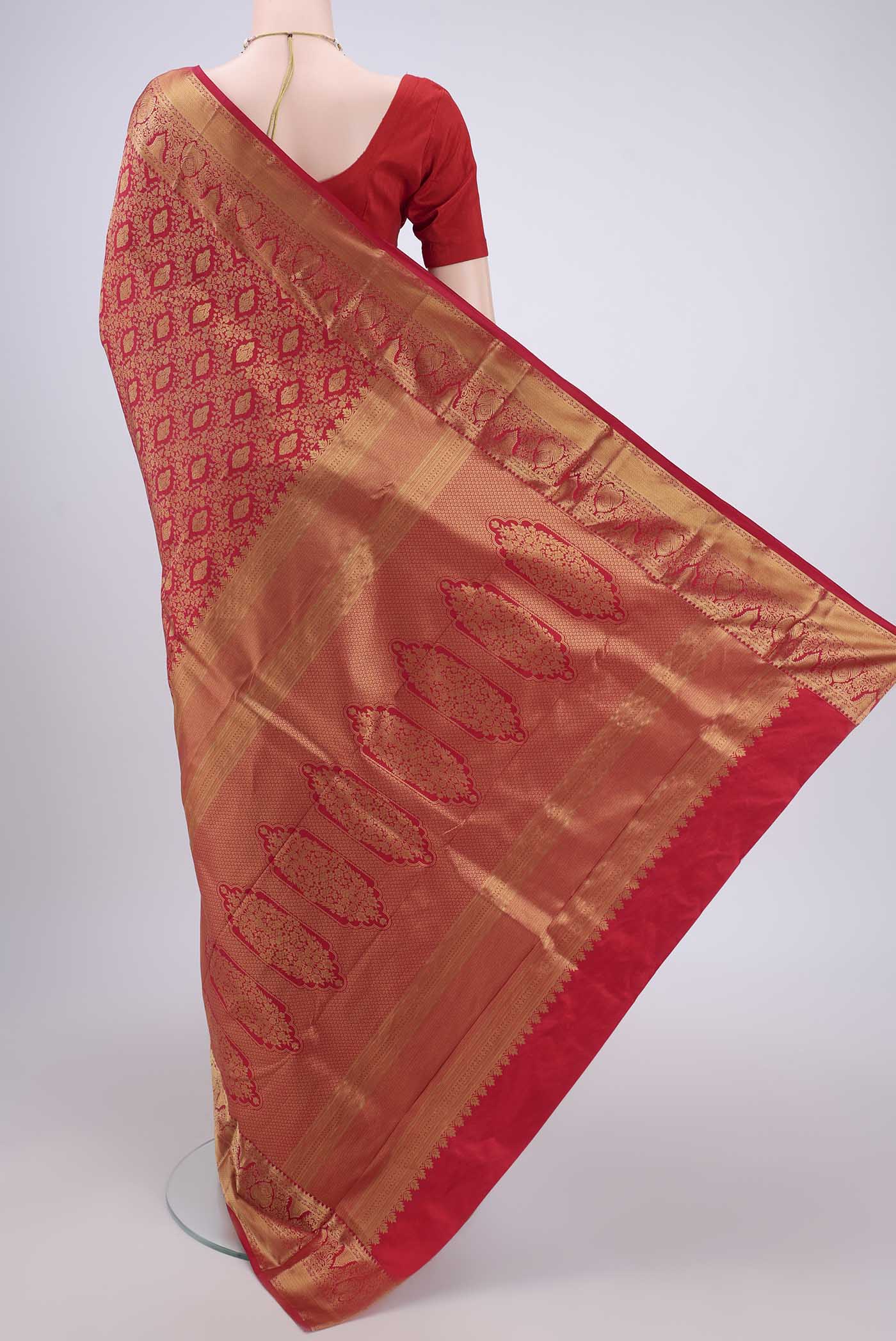 Flat view of Red Bangalore Silk Saree with Zari Brocade on the body and Zari Border. 
