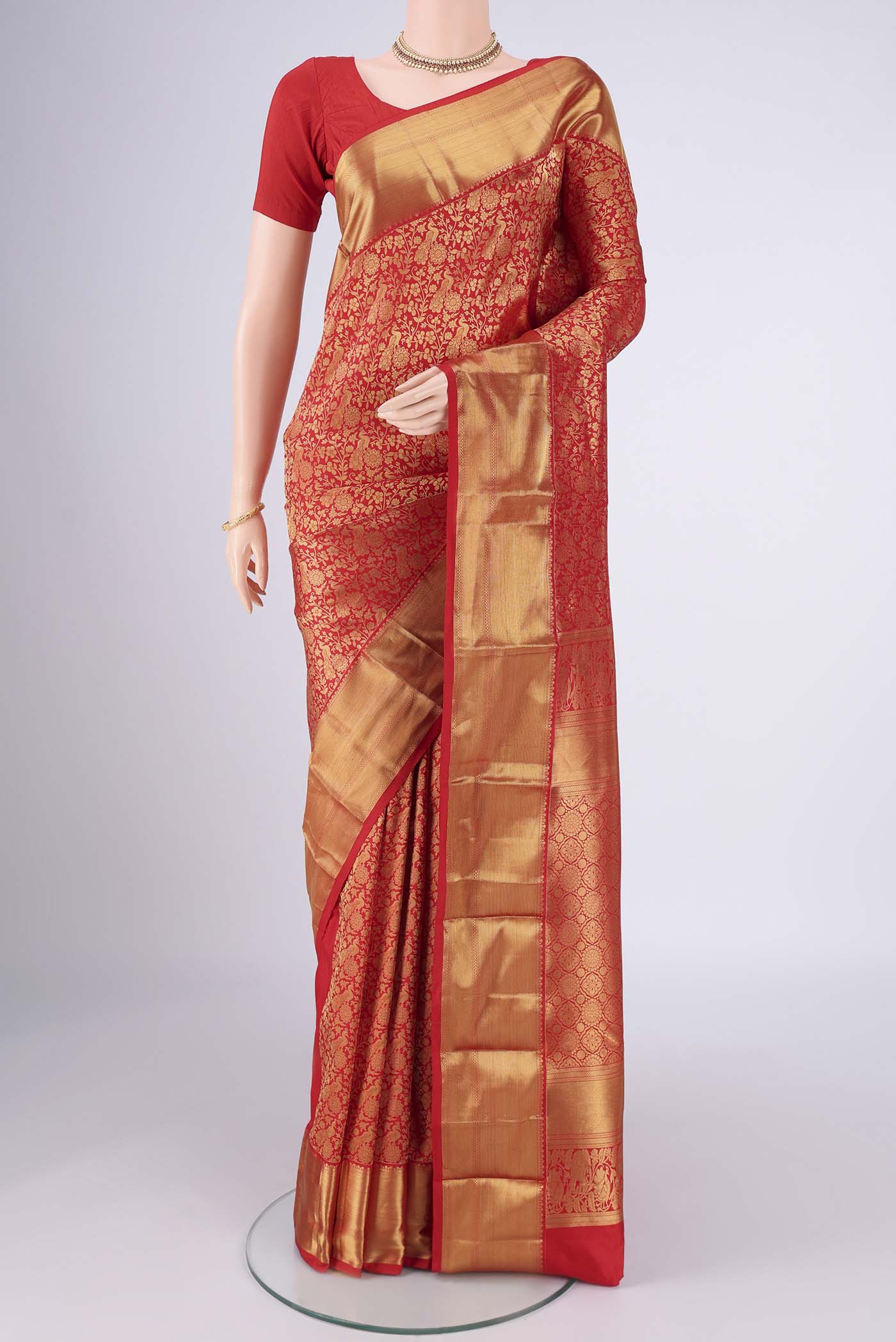 Red Bangalore Silk Saree with Zari Brocade on the body and Zari Border.  displayed on a mannequin