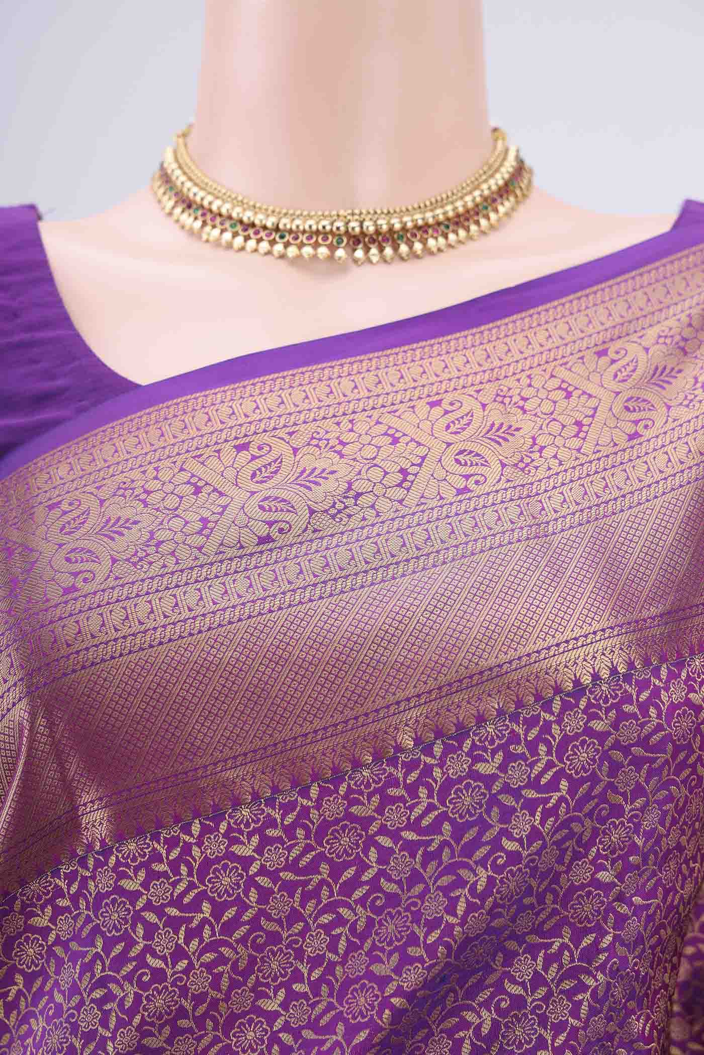 Border image of Purple Bangalore Silk Saree with Zari Brocade on the body and Zari Border. 