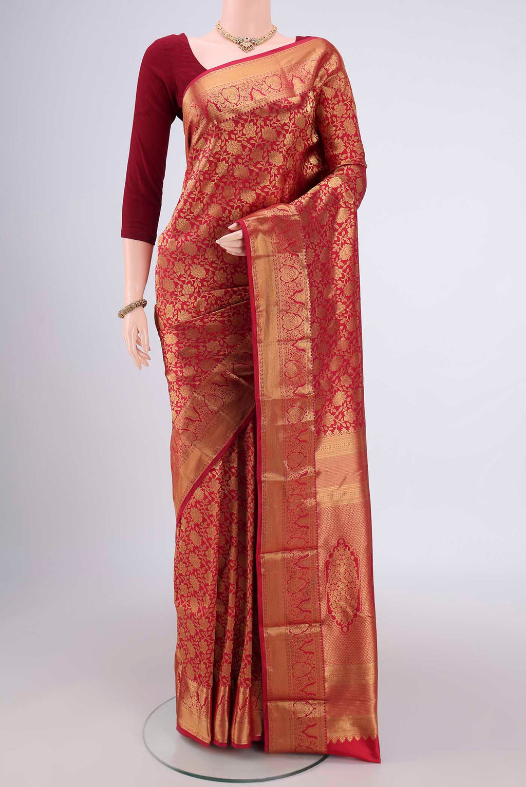 Red Bangalore Silk Saree with Zari Brocade on the body and Zari Border.  displayed on a mannequin