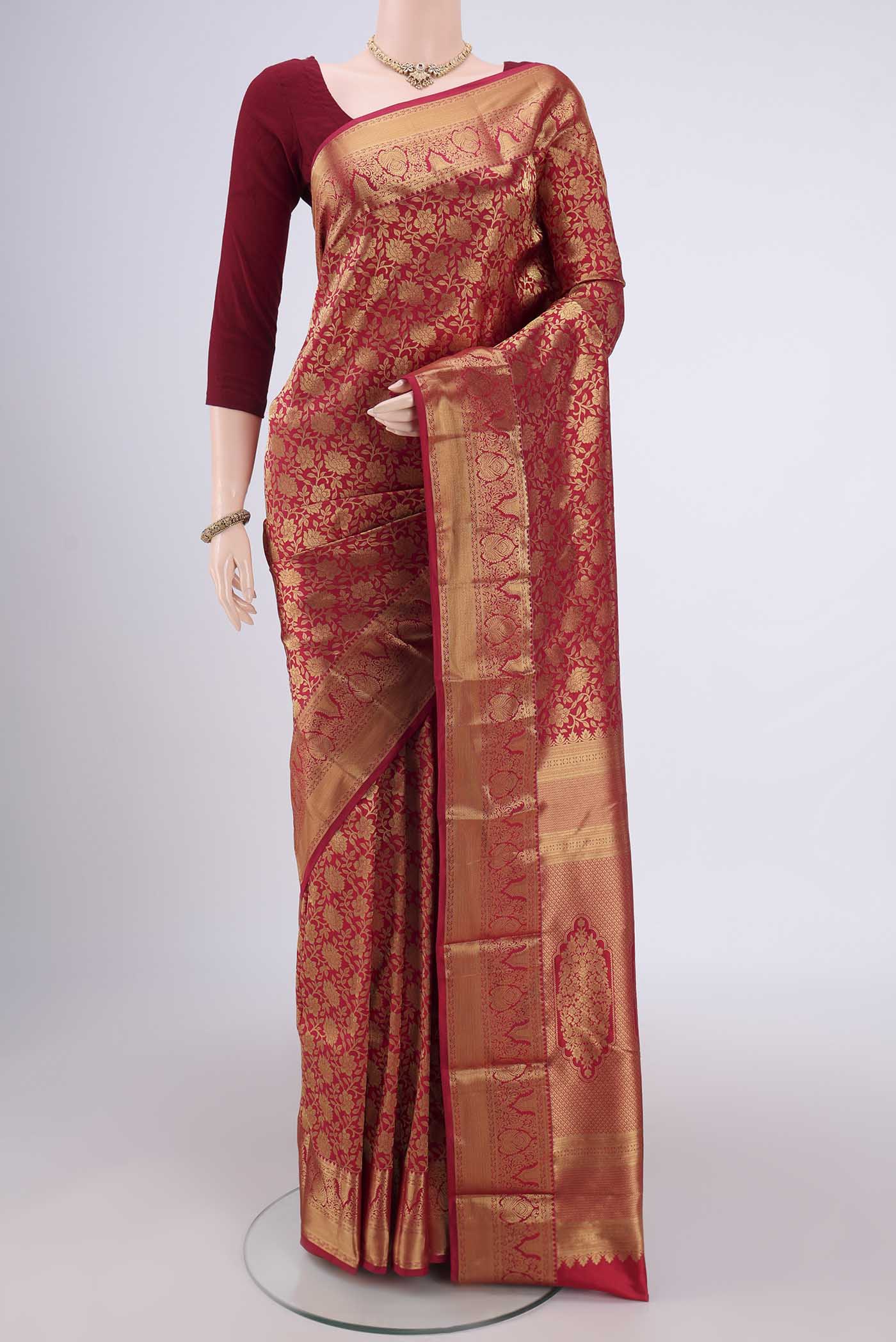 Red Bangalore Silk Saree with Zari Brocade on the body and Zari Border.  displayed on a mannequin