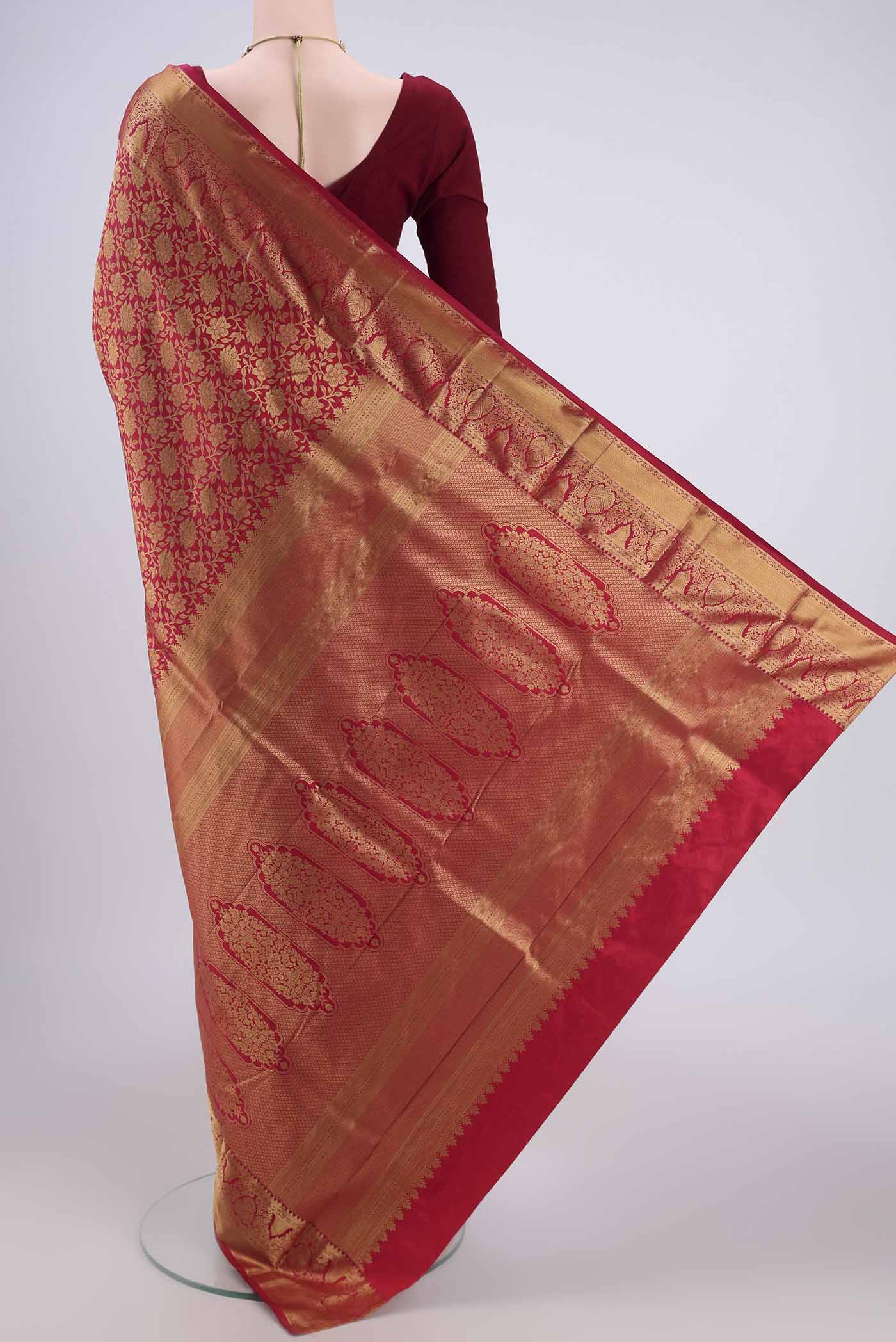 Flat view of Red Bangalore Silk Saree with Zari Brocade on the body and Zari Border. 