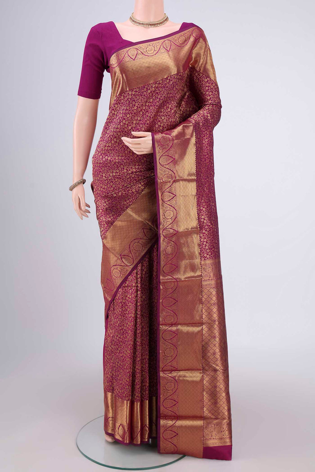 Magenta Bangalore Silk Saree with Zari Brocade on the body and Zari Border.  displayed on a mannequin