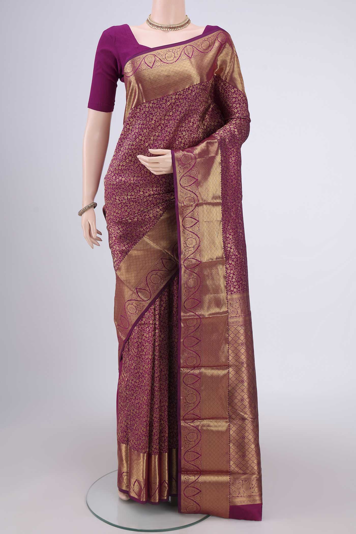 Magenta Bangalore Silk Saree with Zari Brocade on the body and Zari Border.  displayed on a mannequin