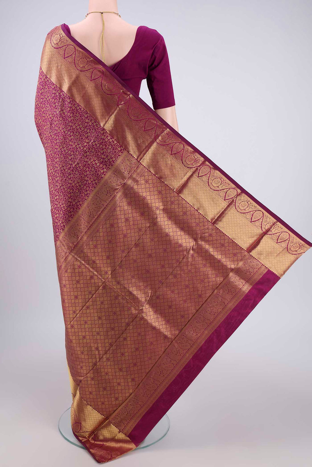 Flat view of Magenta Bangalore Silk Saree with Zari Brocade on the body and Zari Border. 