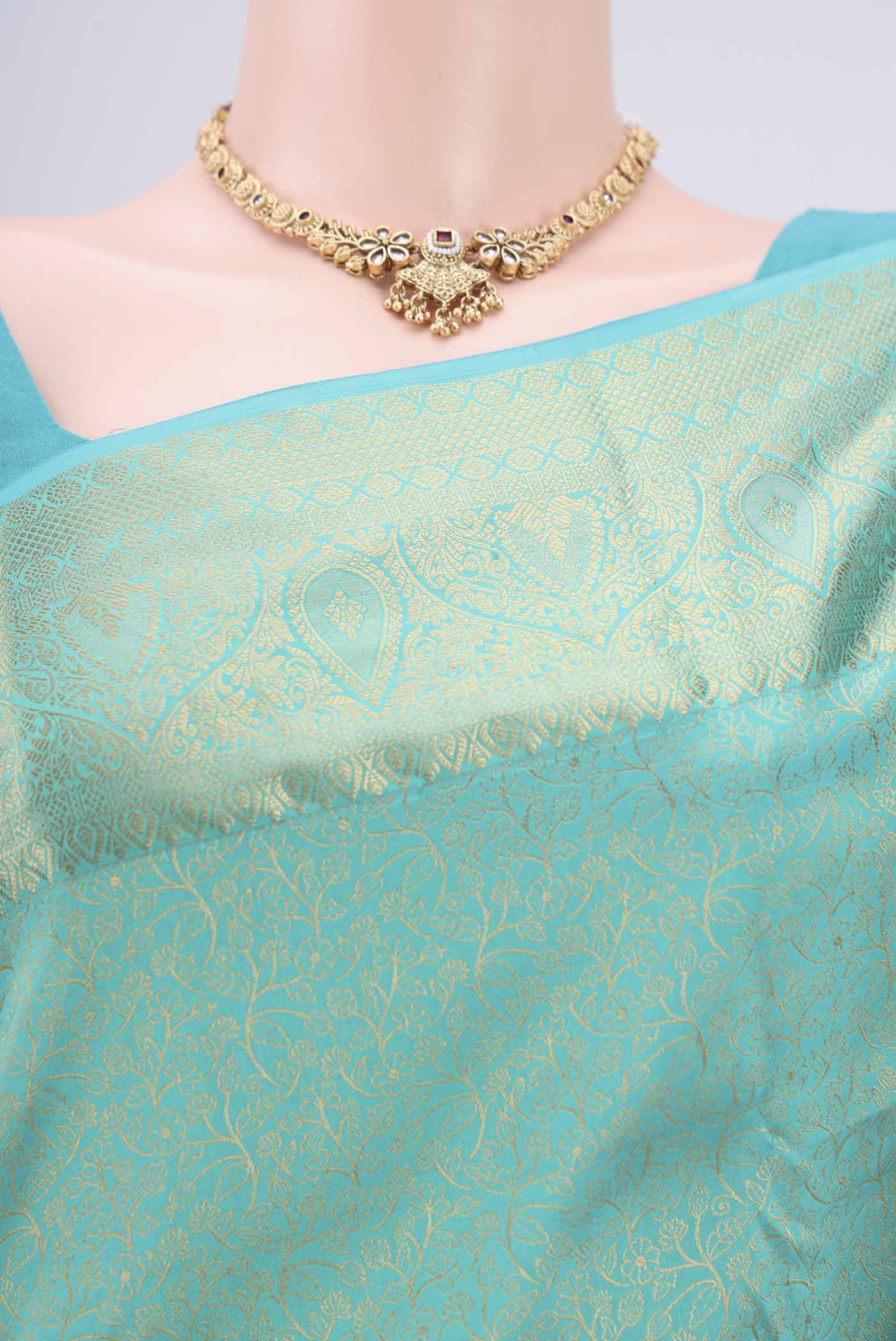 Border image of Turquoise Dual Tone Bangalore Silk Saree with Zari Brocade on the body and Zari Border. 