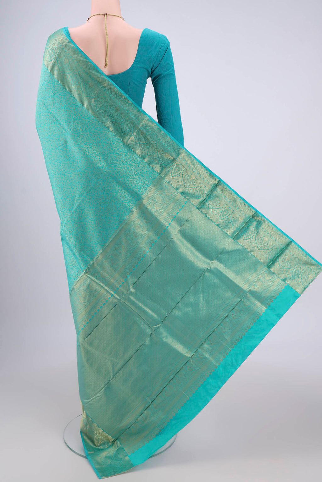Flat view of Turquoise Dual Tone Bangalore Silk Saree with Zari Brocade on the body and Zari Border. 