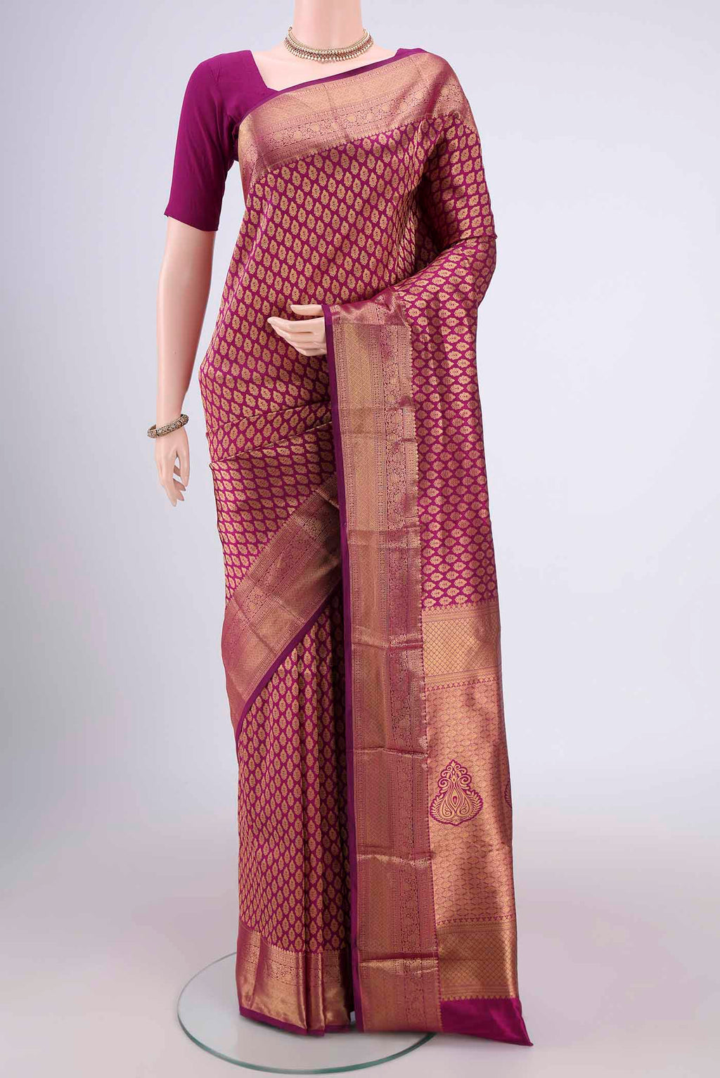 Magenta Dual Tone Bangalore Silk Saree with Zari Brocade on the body and Zari Border.  displayed on a mannequin