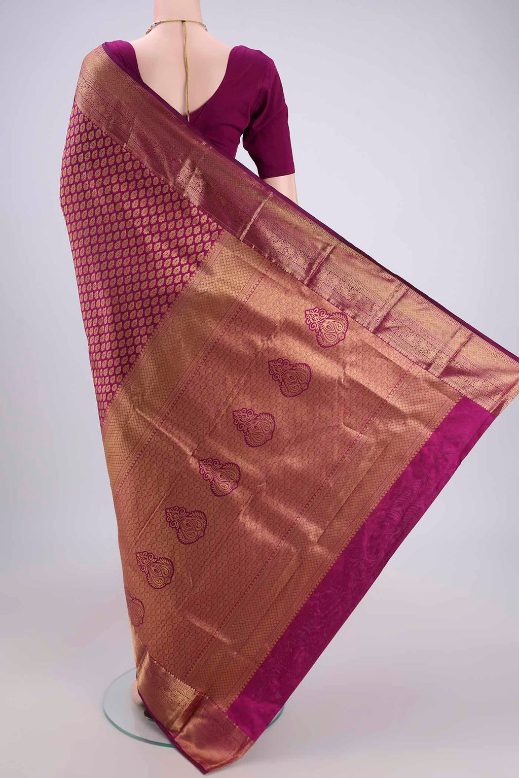 Flat view of Magenta Dual Tone Bangalore Silk Saree with Zari Brocade on the body and Zari Border. 
