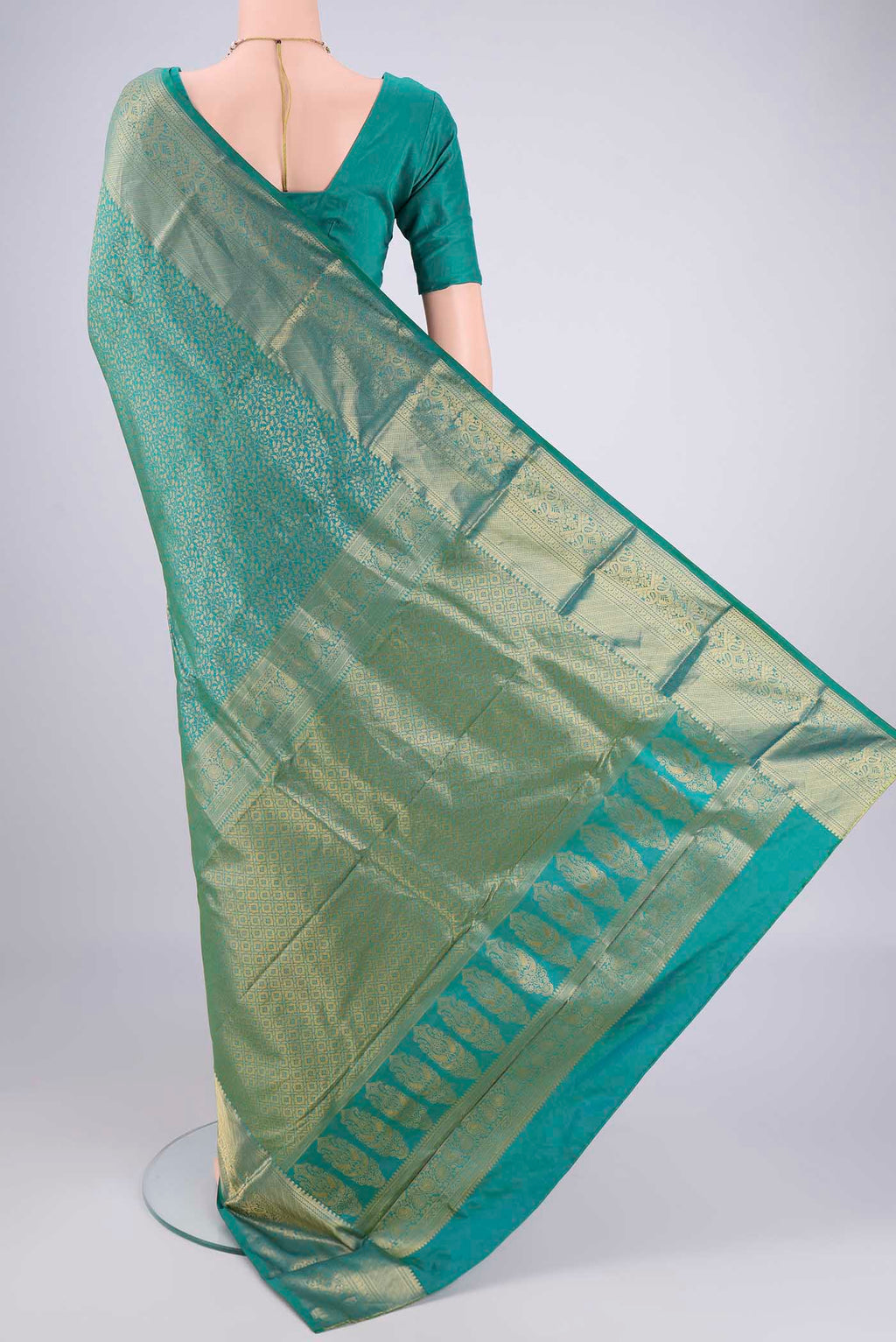 Flat view of Sea Green Bangalore Silk Saree with Zari Brocade on the body and Zari Border. 