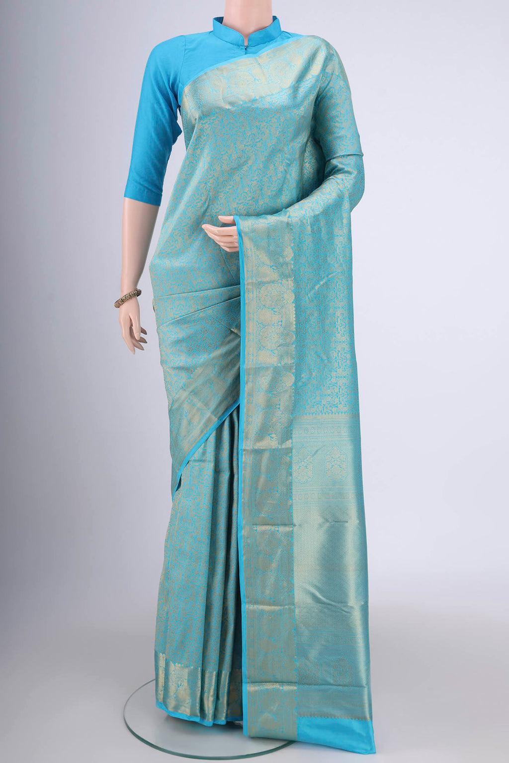 Sky Blue Bangalore Silk Saree with Zari Brocade on the body and Zari Border.  displayed on a mannequin