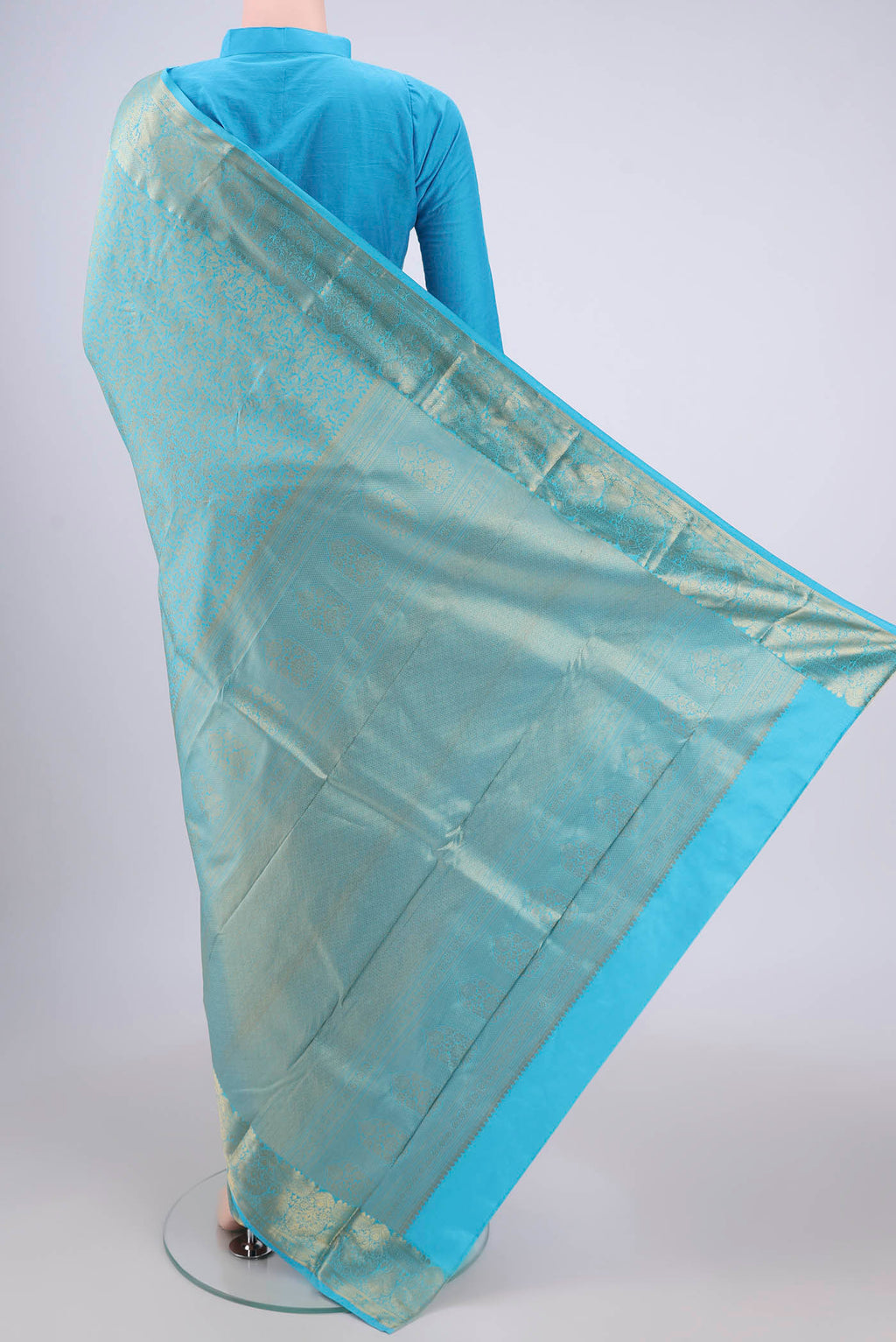 Flat view of Sky Blue Bangalore Silk Saree with Zari Brocade on the body and Zari Border. 