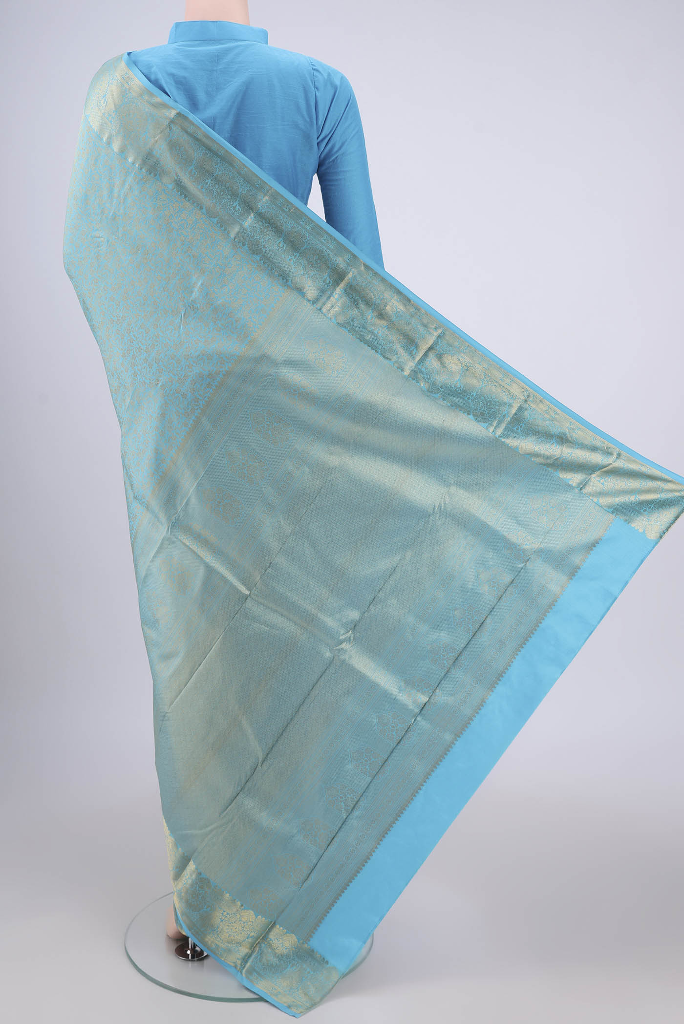 Flat view of Sky Blue Bangalore Silk Saree with Zari Brocade on the body and Zari Border. 