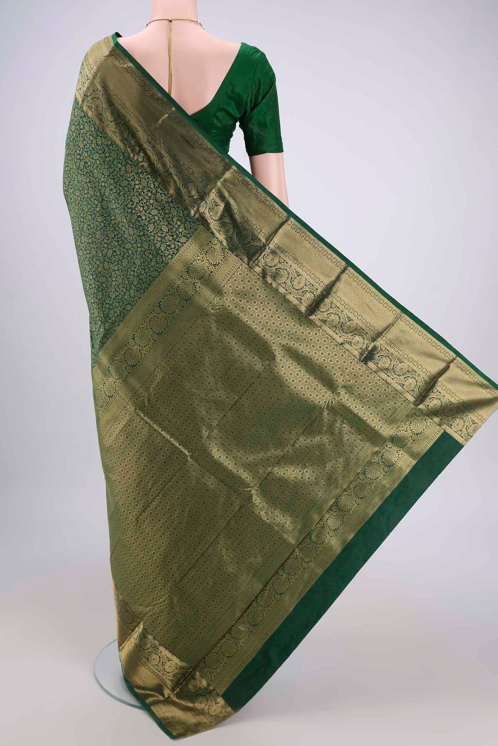 Flat view of Bottle Green Dual Tone Bangalore Silk Saree with Zari Brocade on the body and Zari Border. 
