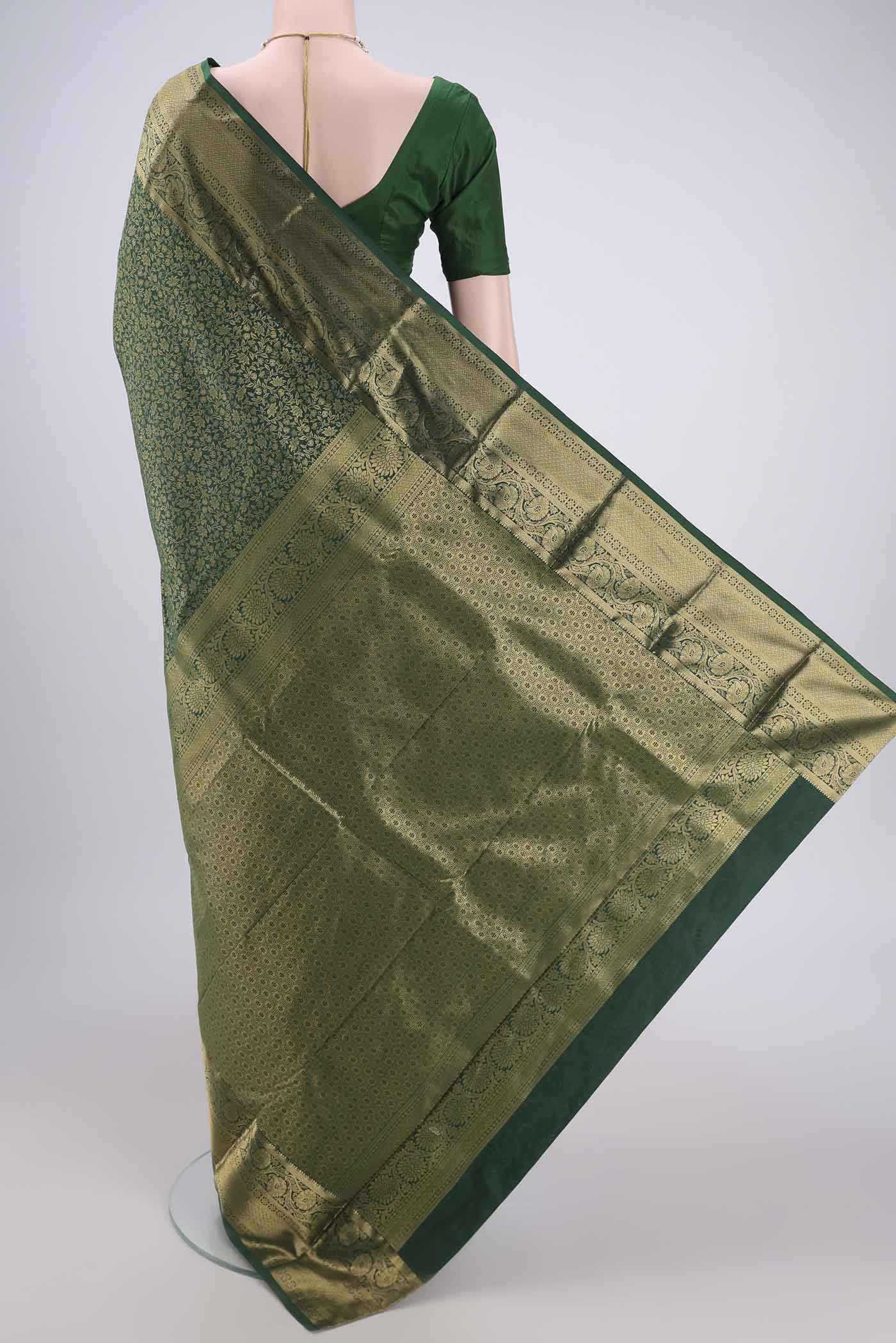 Flat view of Bottle Green Dual Tone Bangalore Silk Saree with Zari Brocade on the body and Zari Border. 