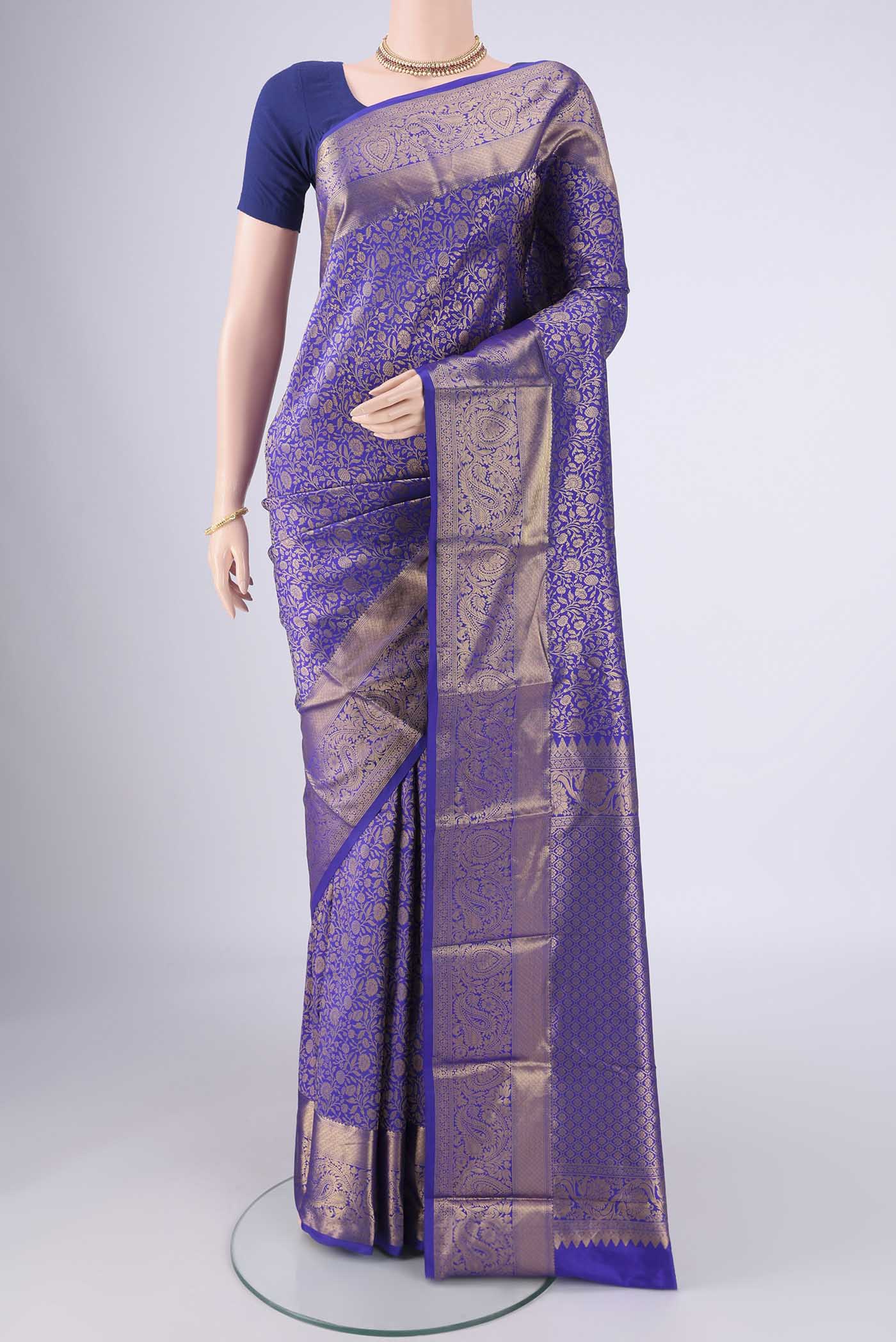 Royal Blue Bangalore Silk Saree with Zari Brocade on the body and Zari Border.  displayed on a mannequin