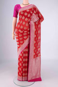 Red Banarasi Georgette Saree with Zari Brocade on the body and Zari Border.  displayed on a mannequin