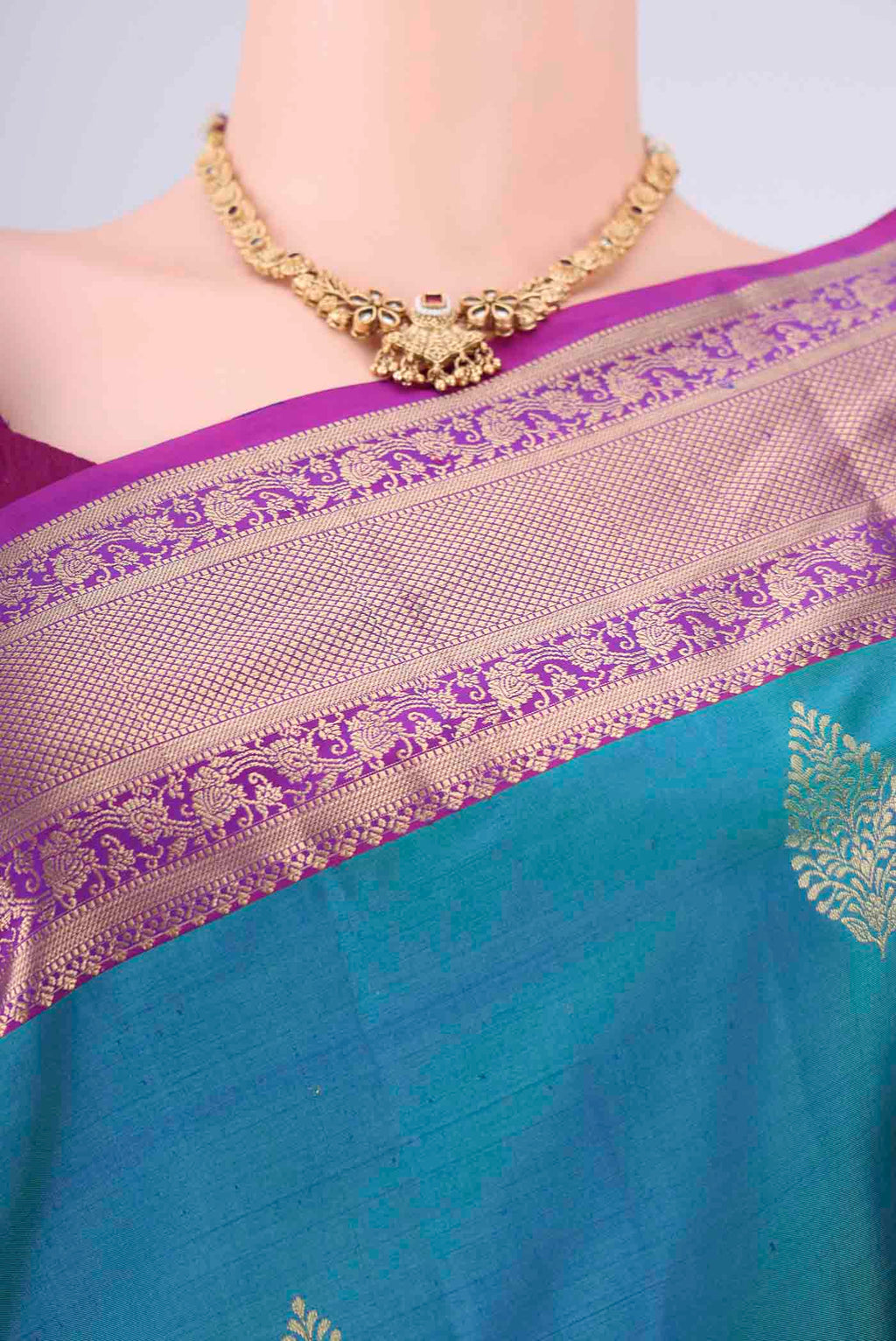 Border image of Blue Dual Tone Soft Silk Saree with Zari Butta on the body and Zari Border. 