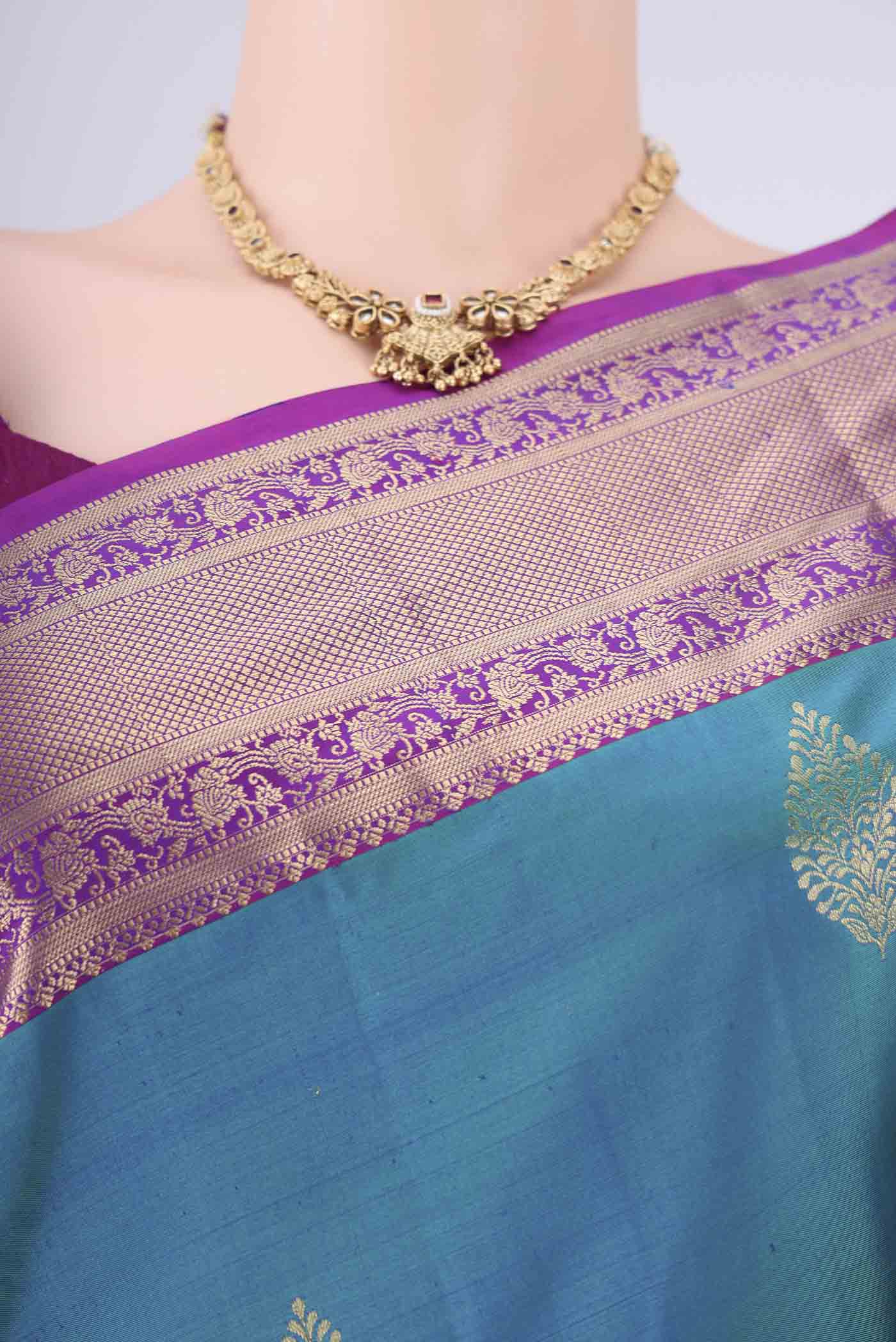 Border image of Blue Dual Tone Soft Silk Saree with Zari Butta on the body and Zari Border. 