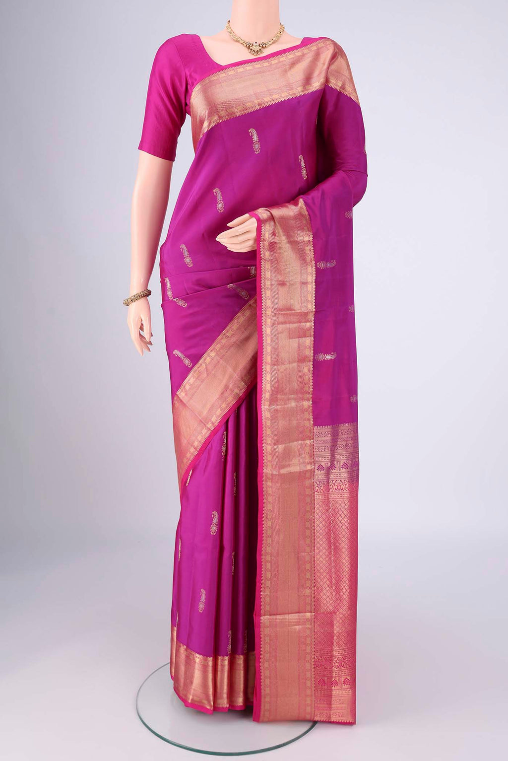 Magenta Dual Tone Soft Silk Saree with Zari Brocade on the body and Zari Border.  displayed on a mannequin