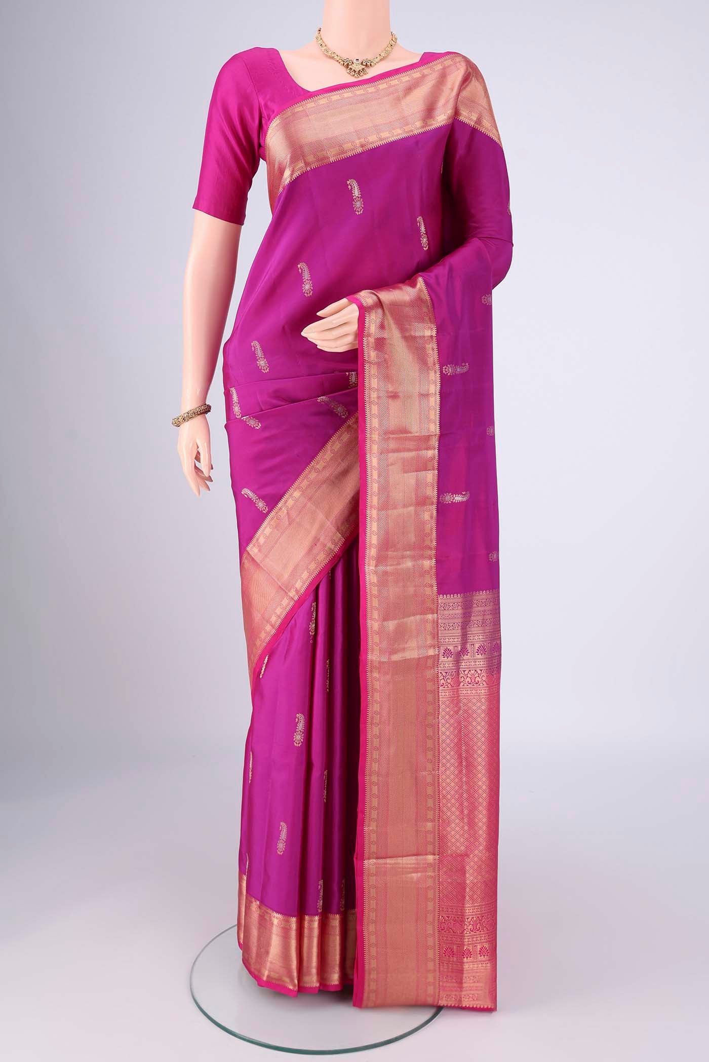 Magenta Dual Tone Soft Silk Saree with Zari Brocade on the body and Zari Border.  displayed on a mannequin