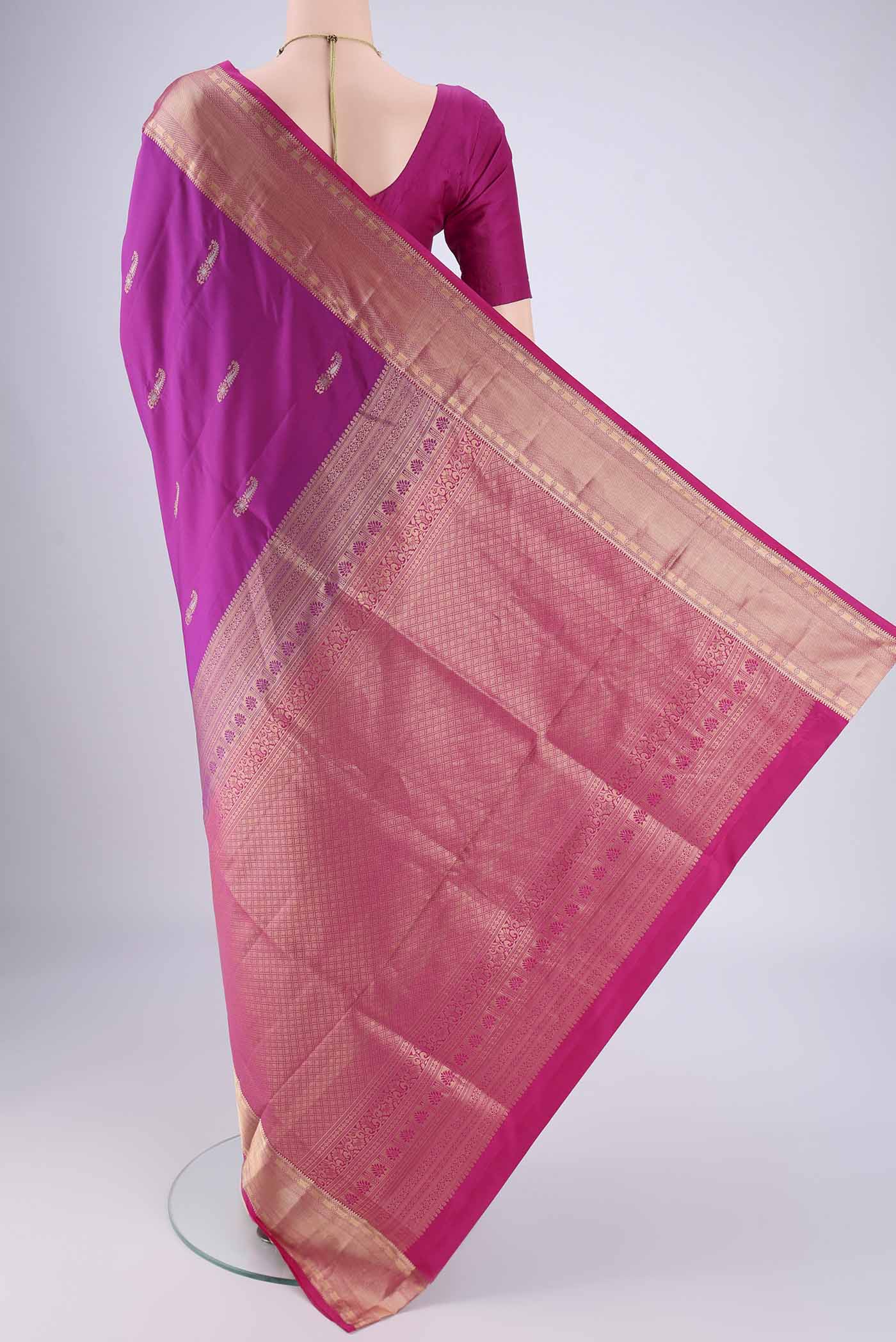 Flat view of Magenta Dual Tone Soft Silk Saree with Zari Brocade on the body and Zari Border. 
