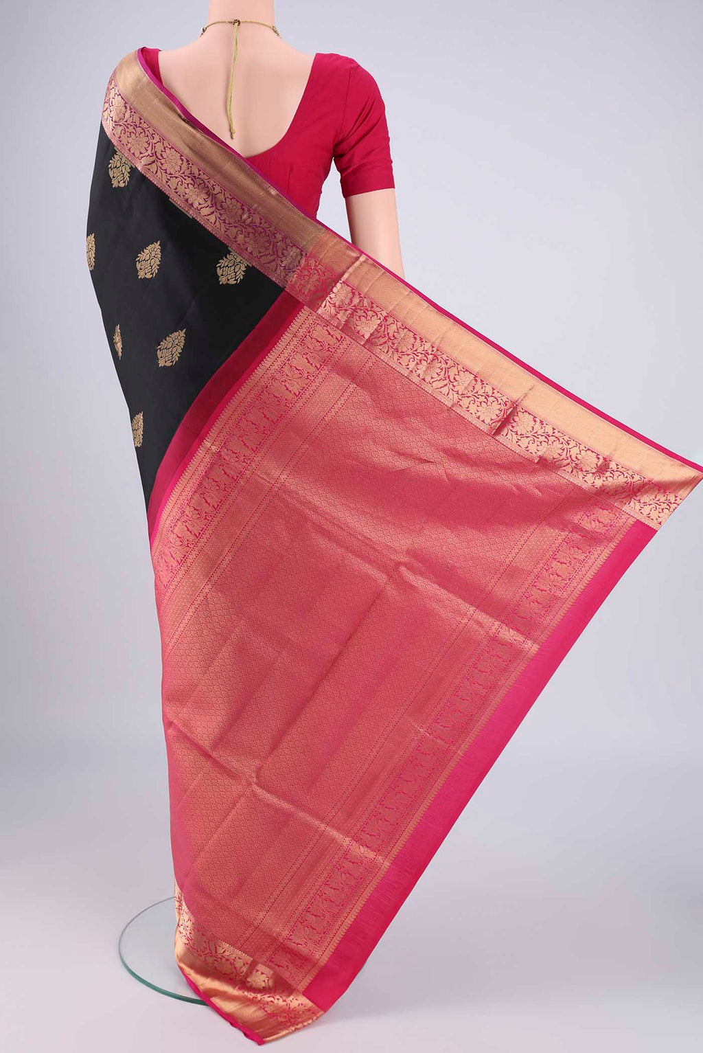 Flat view of Black Dual Tone Soft Silk Saree with Zari Brocade on the body and Zari Border. 