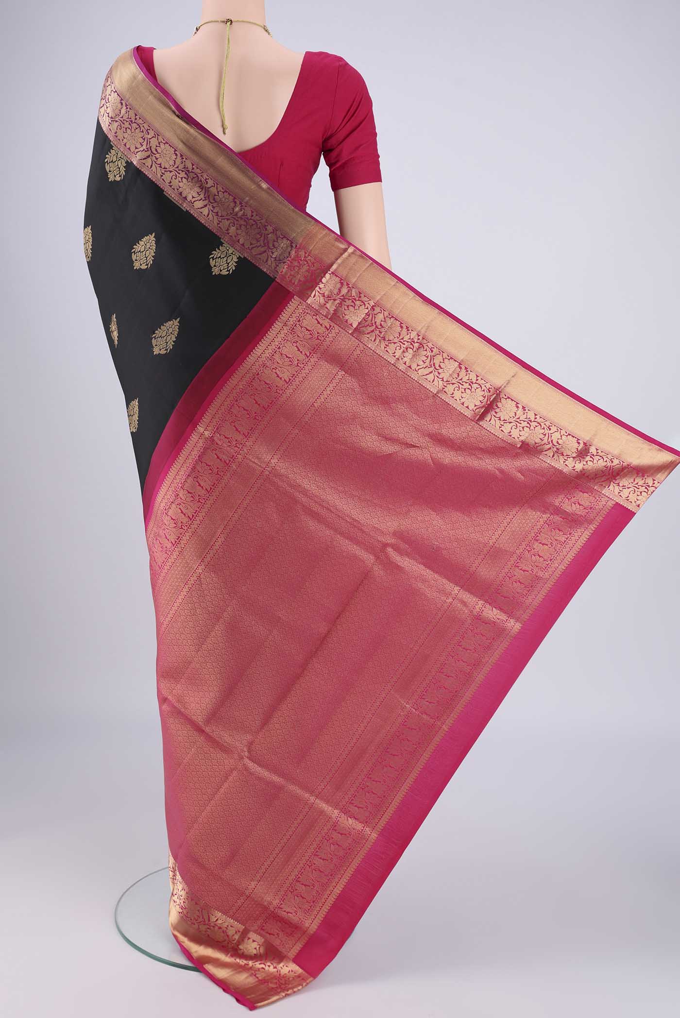 Flat view of Black Dual Tone Soft Silk Saree with Zari Brocade on the body and Zari Border. 