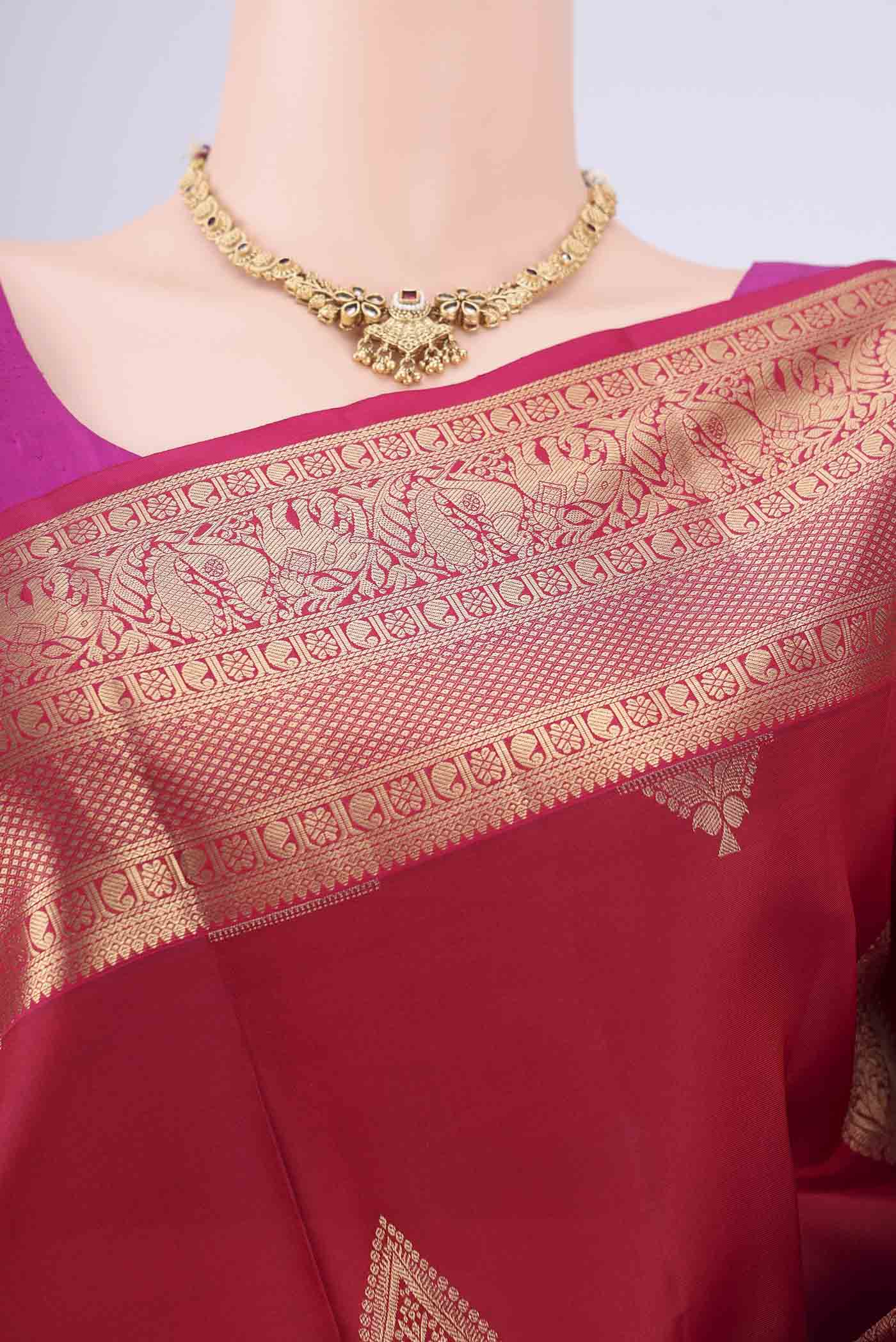 Border image of Maroon Dual Tone Soft Silk Saree with Zari Brocade on the body and Zari Border. 