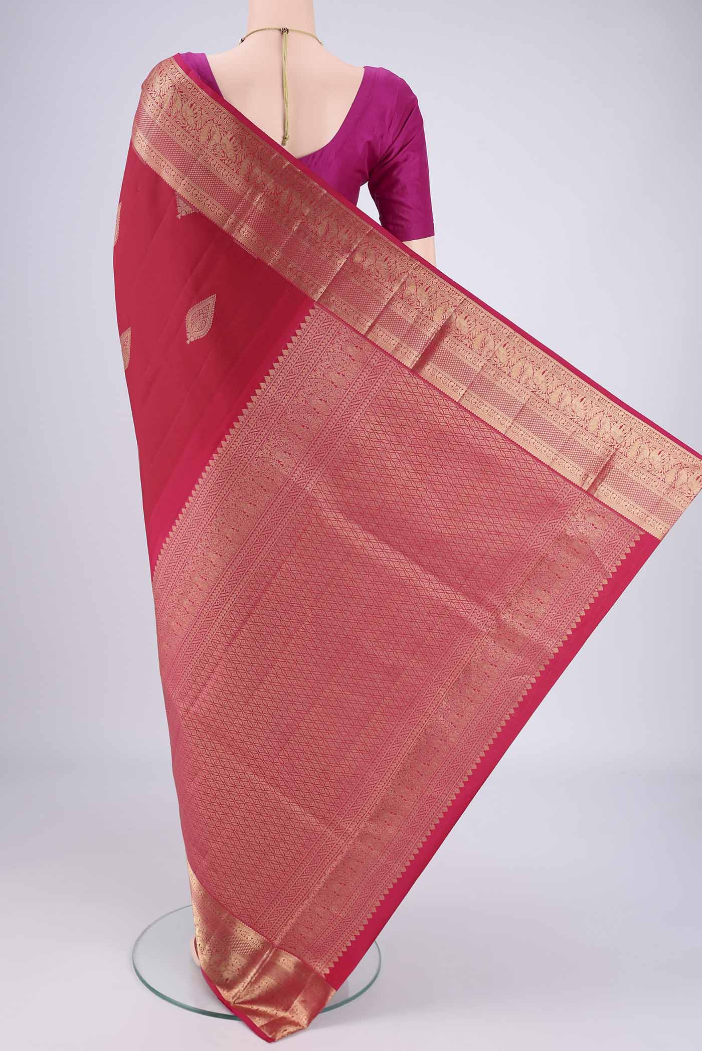 Flat view of Maroon Dual Tone Soft Silk Saree with Zari Brocade on the body and Zari Border. 