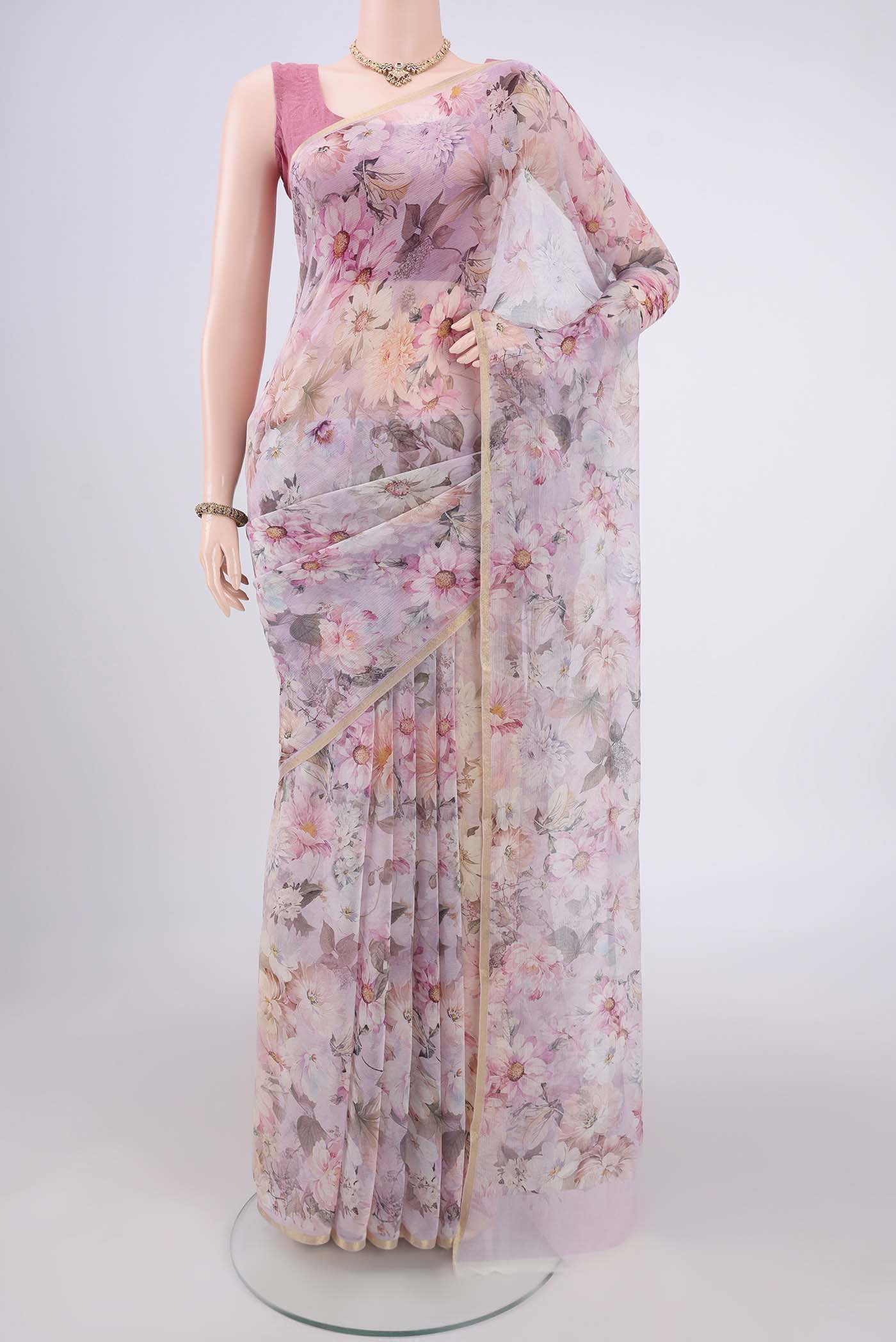 Rose pink Mysore Chiffon Saree with Floral Print on the body and Thin Zari Line.  displayed on a mannequin