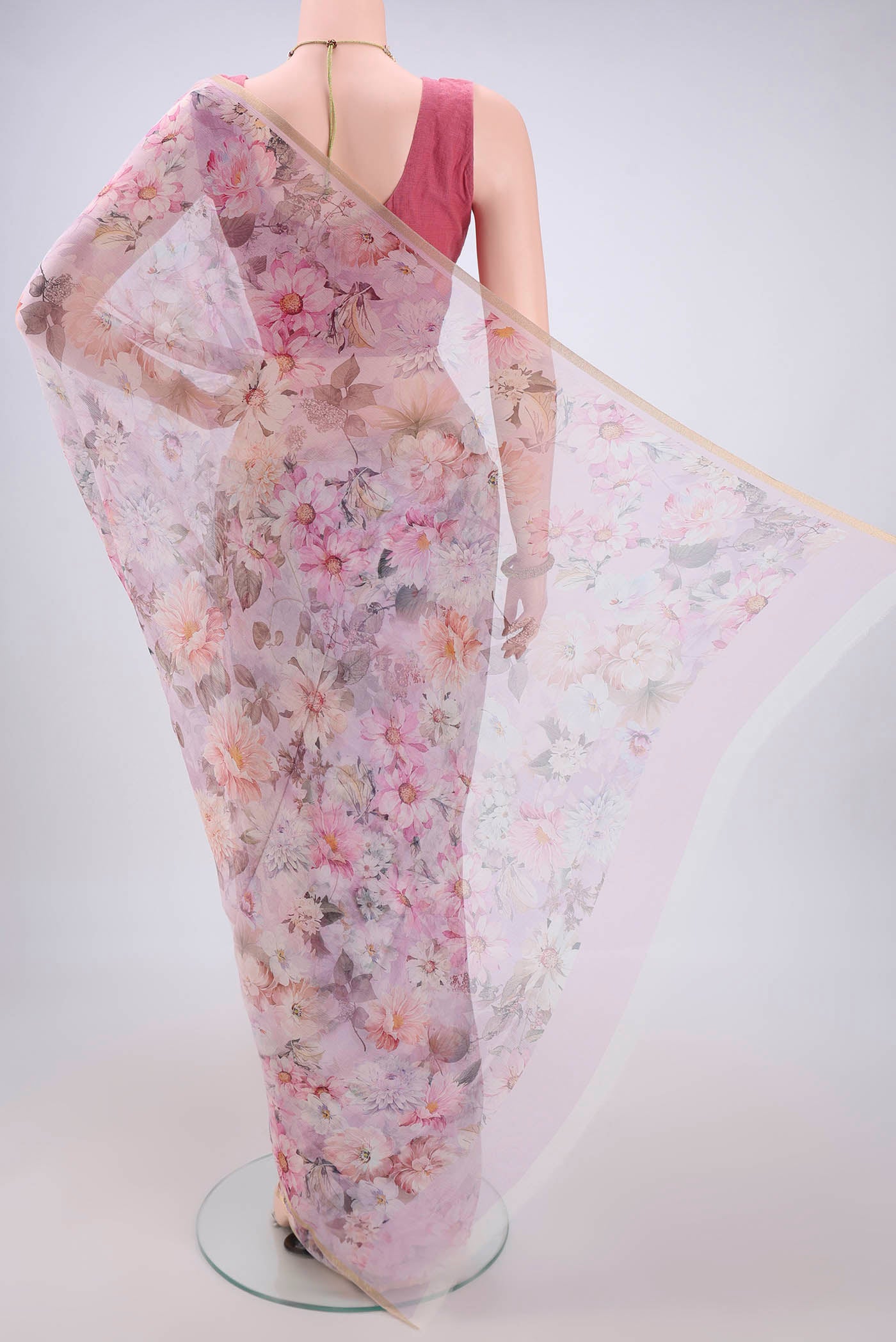 Flat view of Rose pink Mysore Chiffon Saree with Floral Print on the body and Thin Zari Line. 