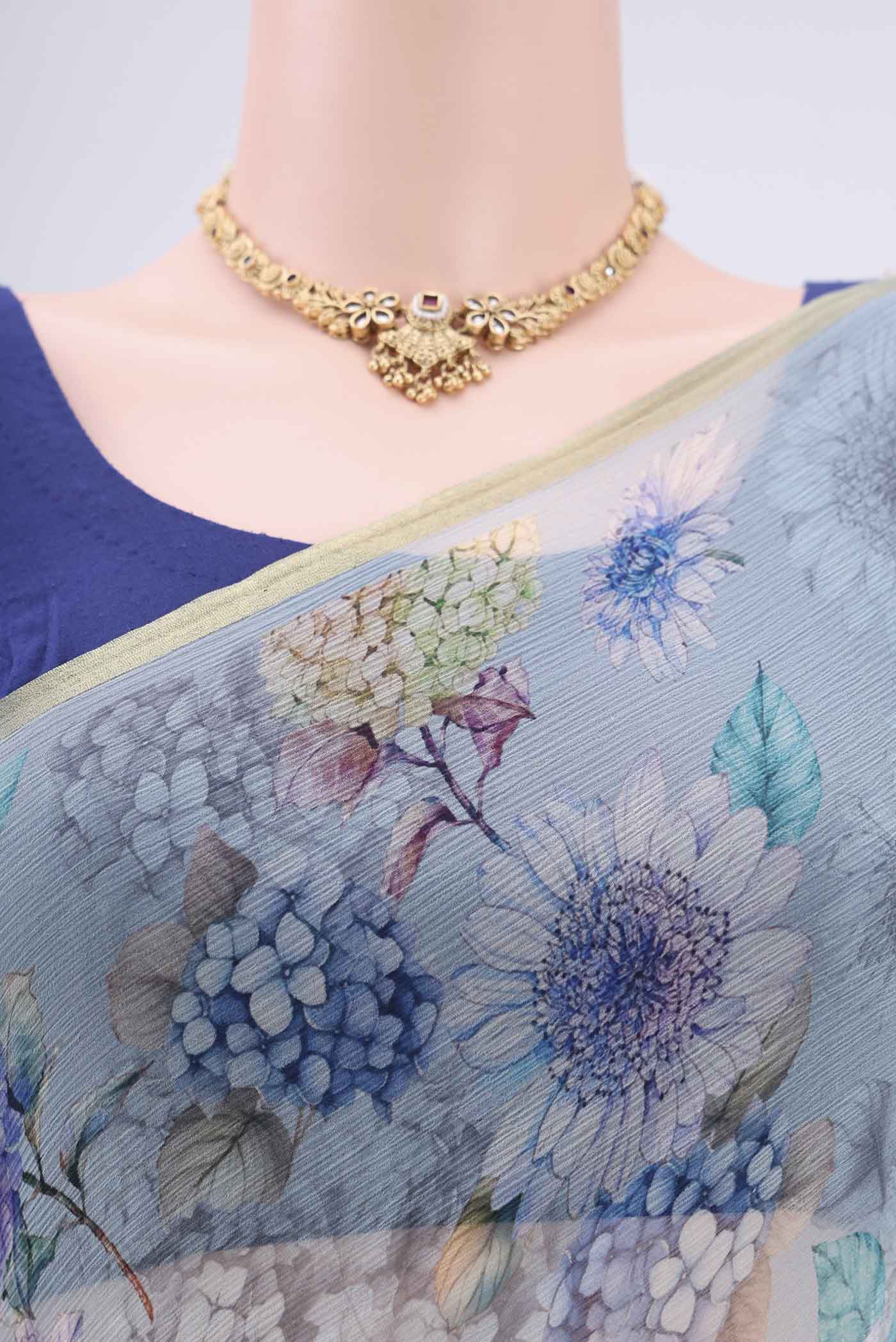 Border image of Sky Blue Mysore Chiffon Saree with Floral Print on the body and Thin Zari Line. 